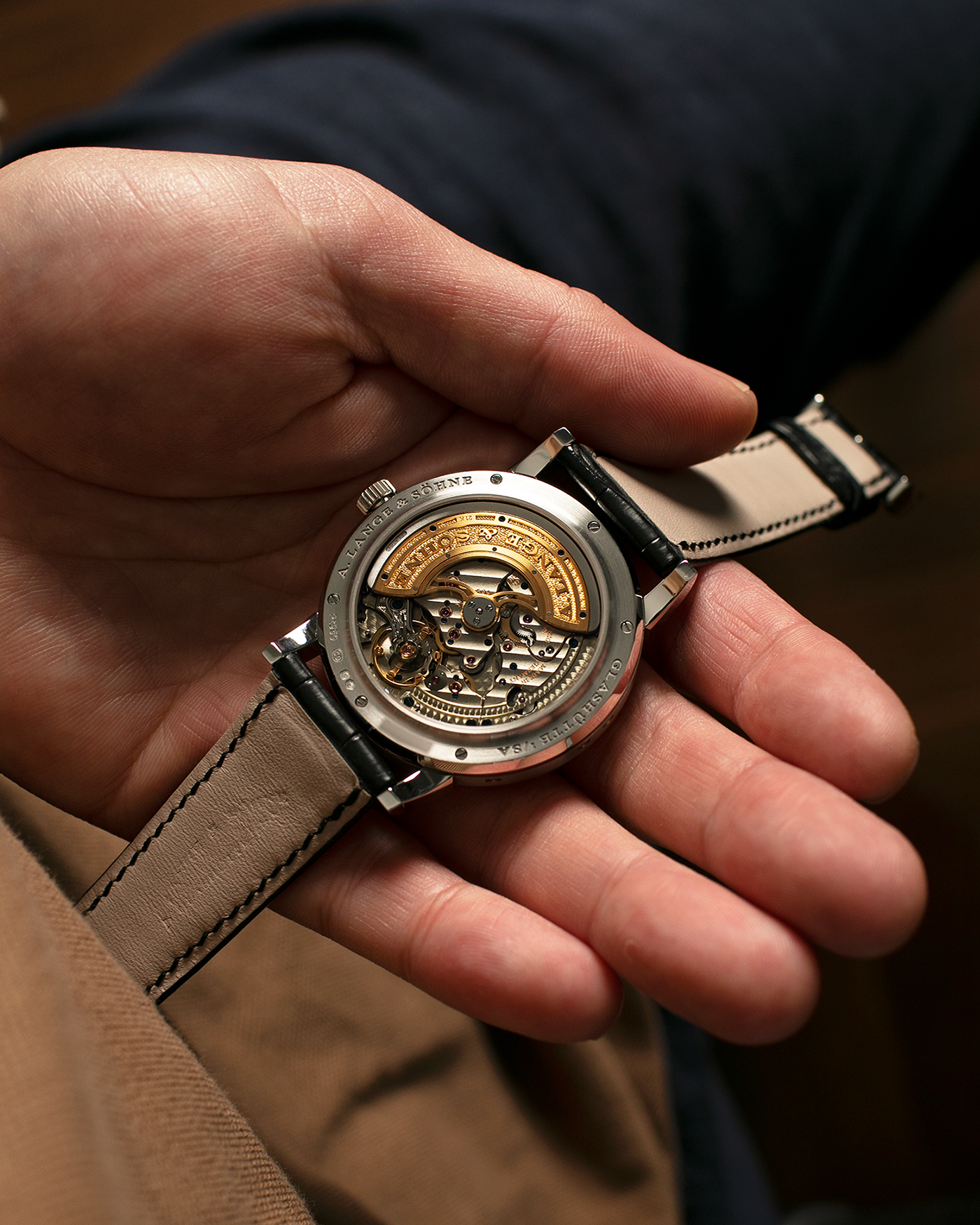 Brand: A. Lange & Söhne
Year: 2023
Model: Lange 1 Perpetual Calendar ‘Darth’
Reference Number: 345.036 E
Material: Platinum 950
Movement: A. Lange & Söhne Cal. L021.3, Self-Winding
Case Dimensions: 41.9mm x 12.1mm (Lug-to-Lug 50mm)
Lug Width: 22mm
Strap: A. Lange & Söhne Black Alligator Leather Strap with Signed Platinum 950 Tang Buckle