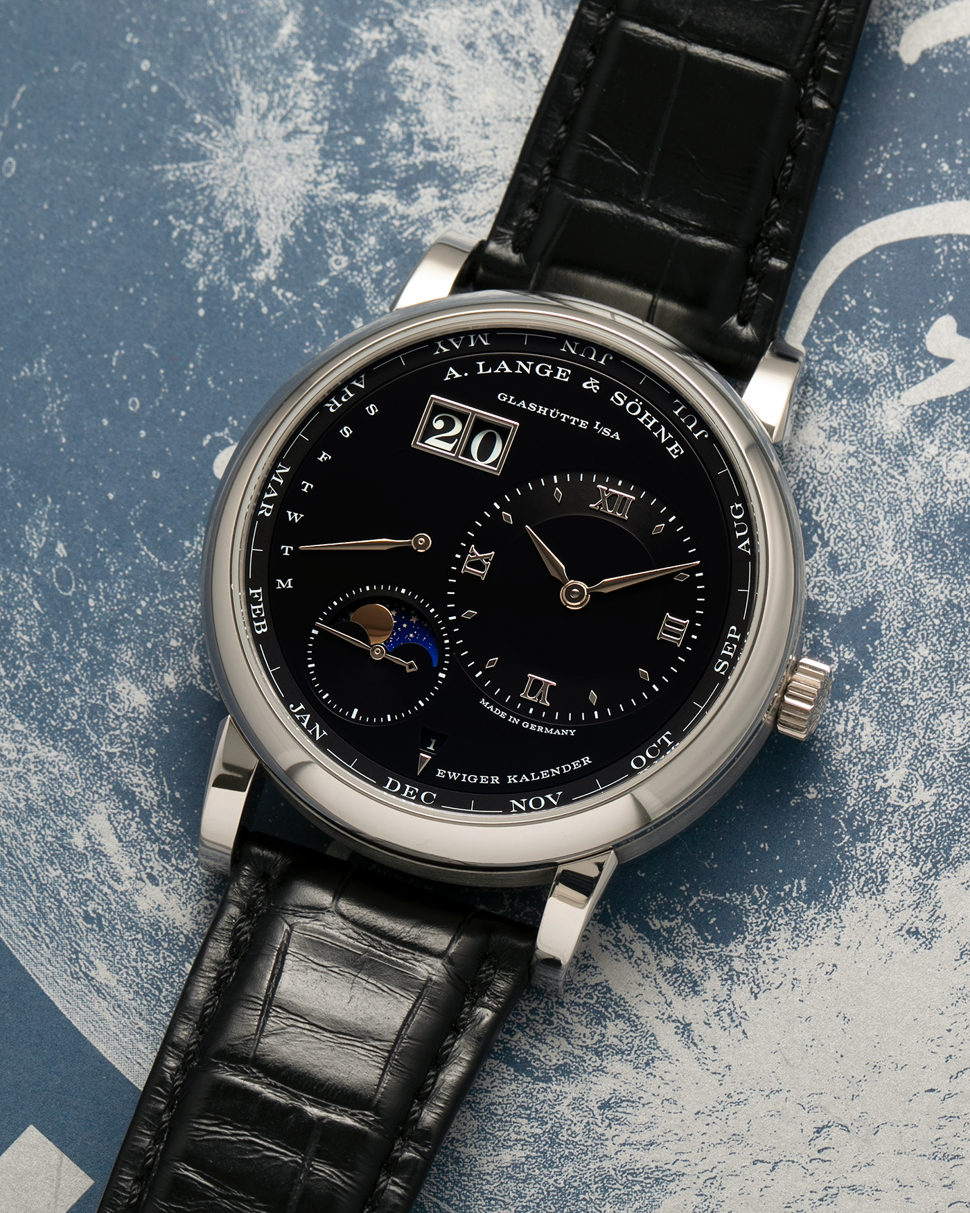 Brand: A. Lange & Söhne
Year: 2023
Model: Lange 1 Perpetual Calendar ‘Darth’
Reference Number: 345.036 E
Material: Platinum 950
Movement: A. Lange & Söhne Cal. L021.3, Self-Winding
Case Dimensions: 41.9mm x 12.1mm (Lug-to-Lug 50mm)
Lug Width: 22mm
Strap: A. Lange & Söhne Black Alligator Leather Strap with Signed Platinum 950 Tang Buckle
