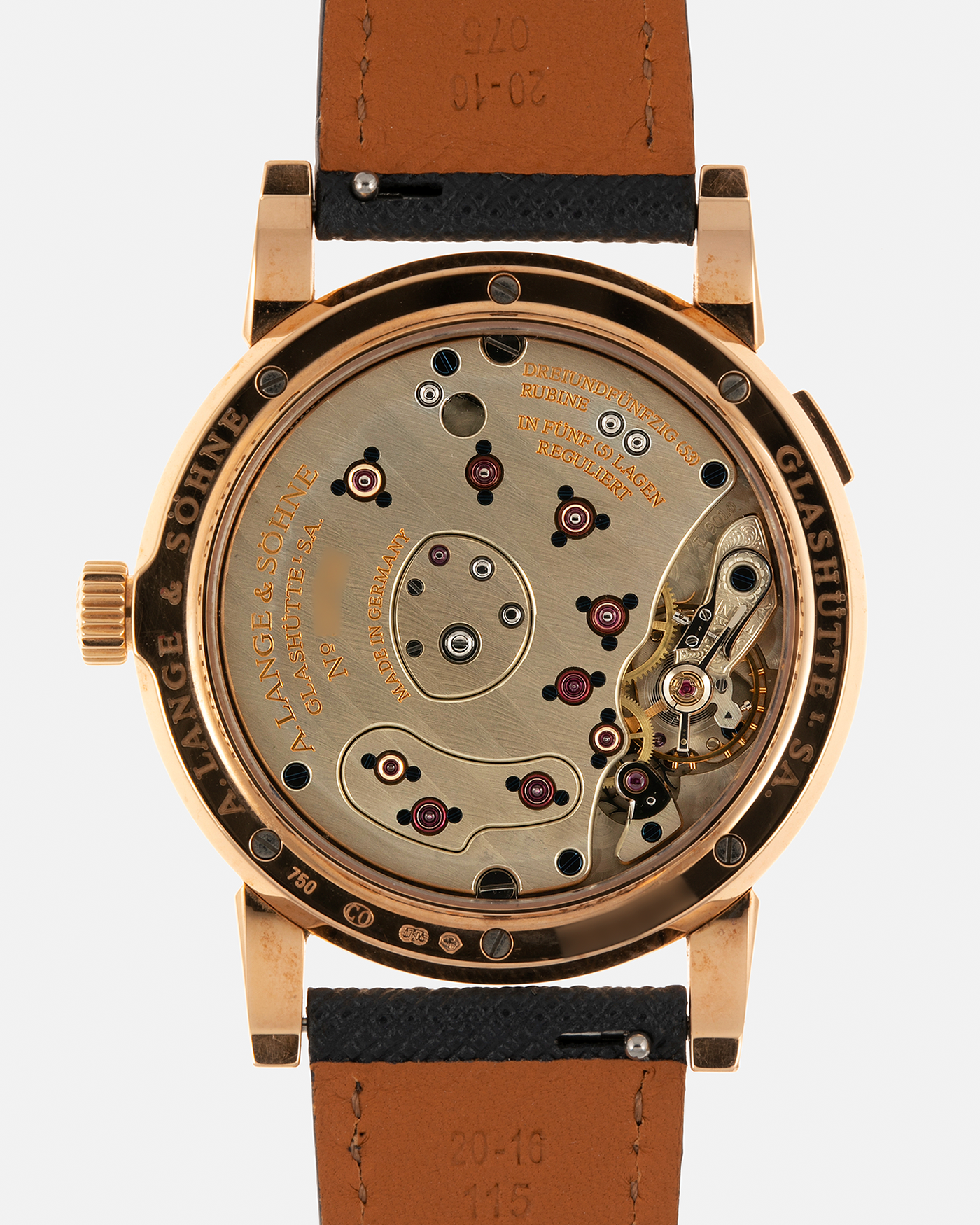 Brand: A. Lange & Sohne Year: 2000s Model: Lange 1 Reference: 101.032 Material: 18-carat Rose Gold, German Silver Movement: A. Lange & Söhne Cal. L901.0, Manual-Winding Case Diameter: 38.5mm Lug Width: 20mm Strap: Molequin Navy Blue Textured Calf Leather Strap with Signed 18-carat Rose Gold Tang Buckle, with additional A. Lange & Söhne Black Alligator Leather Strap (Used)