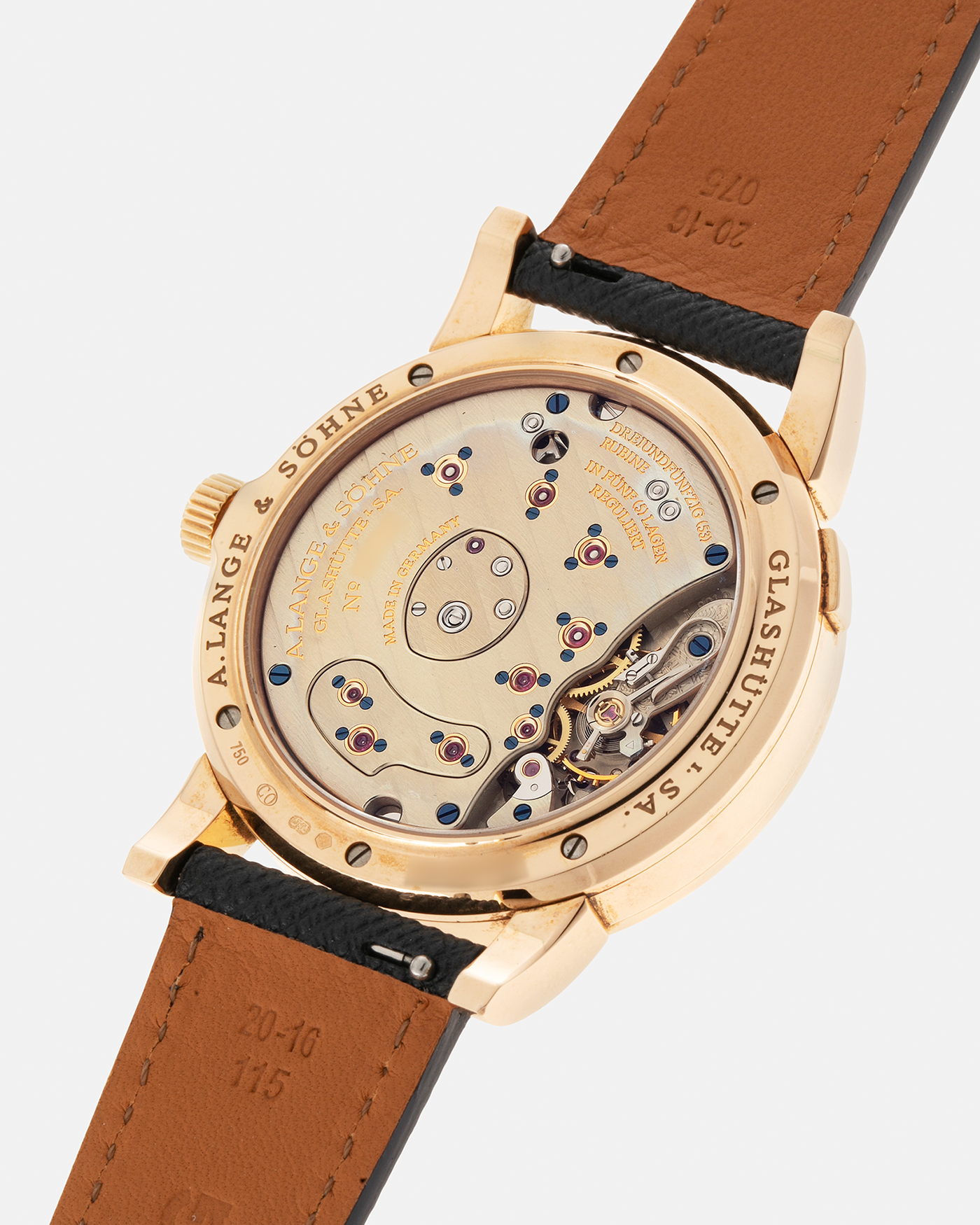 Brand: A. Lange & Sohne Year: 2000s Model: Lange 1 Reference: 101.032 Material: 18-carat Rose Gold, German Silver Movement: A. Lange & Söhne Cal. L901.0, Manual-Winding Case Diameter: 38.5mm Lug Width: 20mm Strap: Molequin Navy Blue Textured Calf Leather Strap with Signed 18-carat Rose Gold Tang Buckle, with additional A. Lange & Söhne Black Alligator Leather Strap (Used)