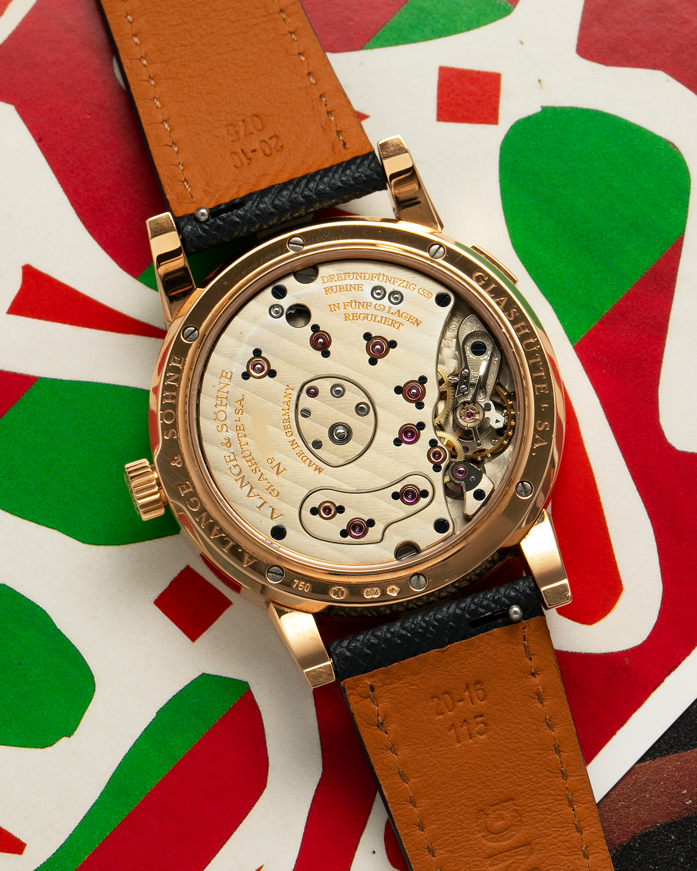 Brand: A. Lange & Sohne Year: 2000s Model: Lange 1 Reference: 101.032 Material: 18-carat Rose Gold, German Silver Movement: A. Lange & Söhne Cal. L901.0, Manual-Winding Case Diameter: 38.5mm Lug Width: 20mm Strap: Molequin Navy Blue Textured Calf Leather Strap with Signed 18-carat Rose Gold Tang Buckle, with additional A. Lange & Söhne Black Alligator Leather Strap (Used)