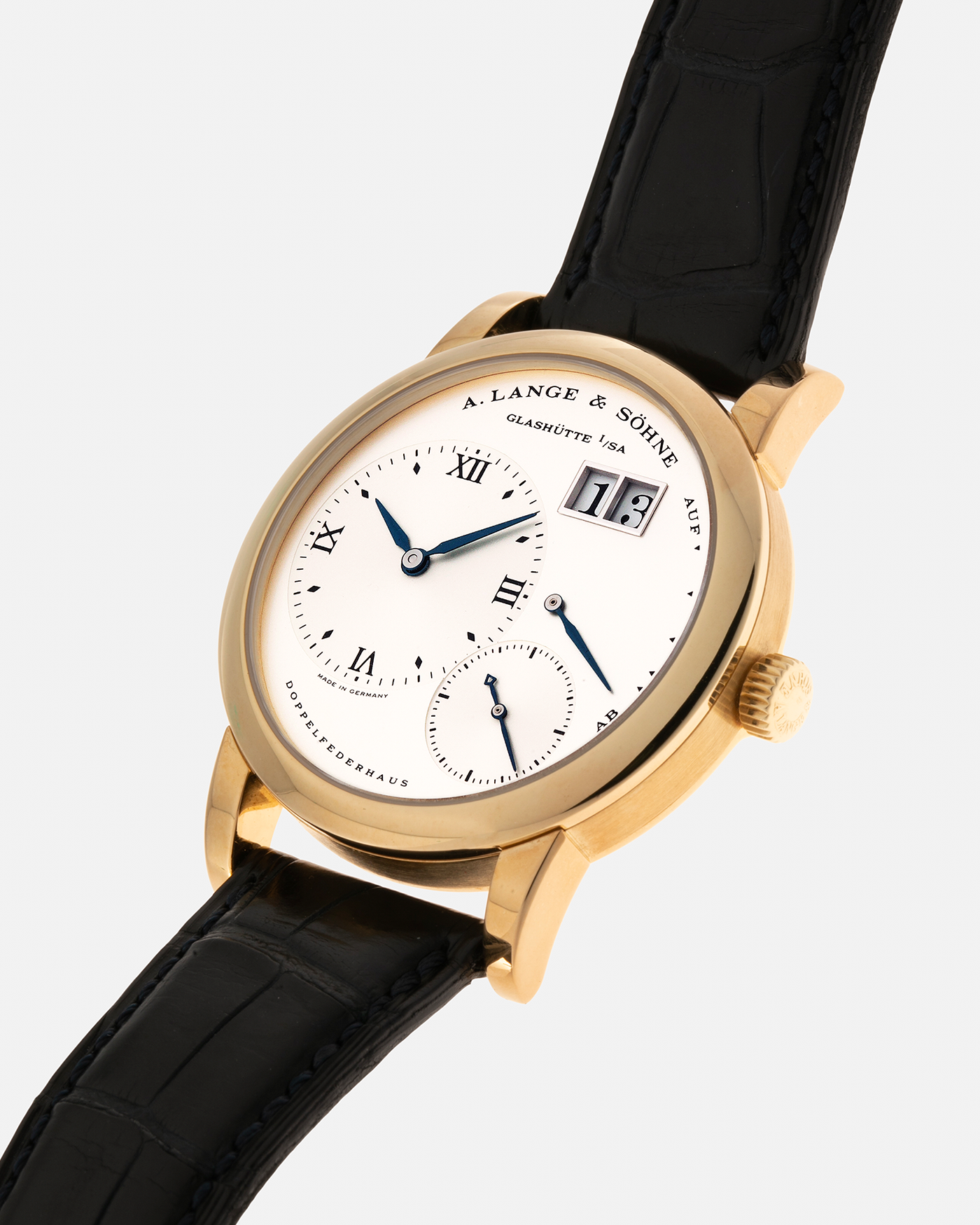 Brand: A. Lange & Söhne Year: 2000s Model: Lange 1 Reference: 101.022 Material: 18-carat Yellow Gold, German Silver Movement: A. Lange & Söhne Cal. L901.0, Manual-Winding Case Diameter: 38.5mm Lug Width: 20mm Strap: A. Lange & Söhne Black Alligator Leather Strap with Signed 18-carat Yellow Gold Tang Buckle