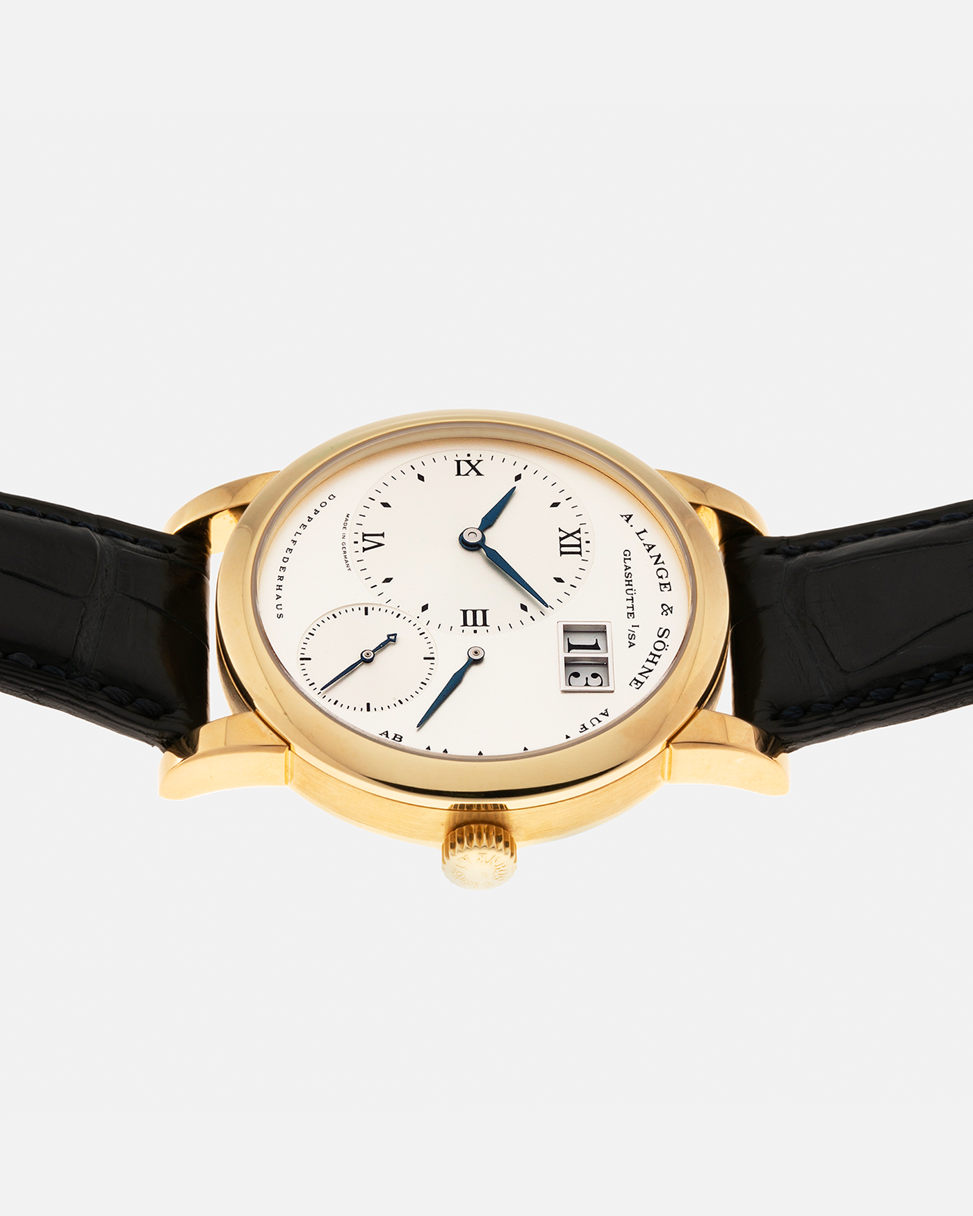 Brand: A. Lange & Söhne Year: 2000s Model: Lange 1 Reference: 101.022 Material: 18-carat Yellow Gold, German Silver Movement: A. Lange & Söhne Cal. L901.0, Manual-Winding Case Diameter: 38.5mm Lug Width: 20mm Strap: A. Lange & Söhne Black Alligator Leather Strap with Signed 18-carat Yellow Gold Tang Buckle