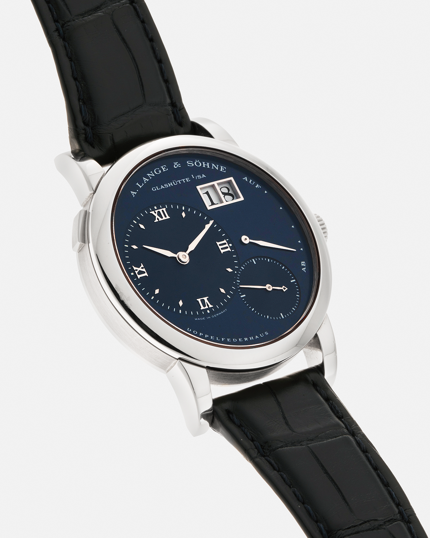 Brand: A. Lange & Söhne Year: 2000’s Model: Lange 1 Reference Number: 101.027 Material: 18-carat White Gold Movement: A. Lange & Söhne Cal. L901.5, Manual Winding Case Diameter: 38.5mm Strap: A. Lange & Söhne Black Alligator Leather Strap with Signed 18-carat White Gold Tang Buckle