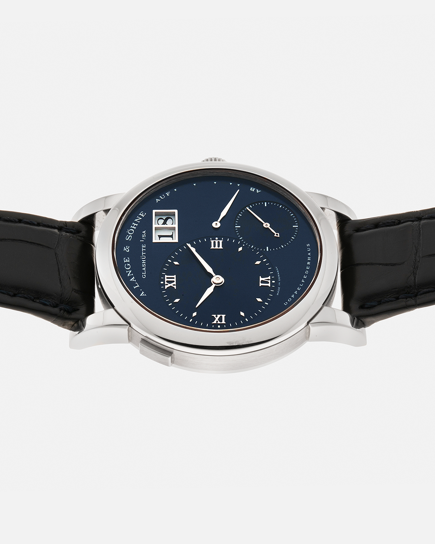 Brand: A. Lange & Söhne Year: 2000’s Model: Lange 1 Reference Number: 101.027 Material: 18-carat White Gold Movement: A. Lange & Söhne Cal. L901.5, Manual Winding Case Diameter: 38.5mm Strap: A. Lange & Söhne Black Alligator Leather Strap with Signed 18-carat White Gold Tang Buckle