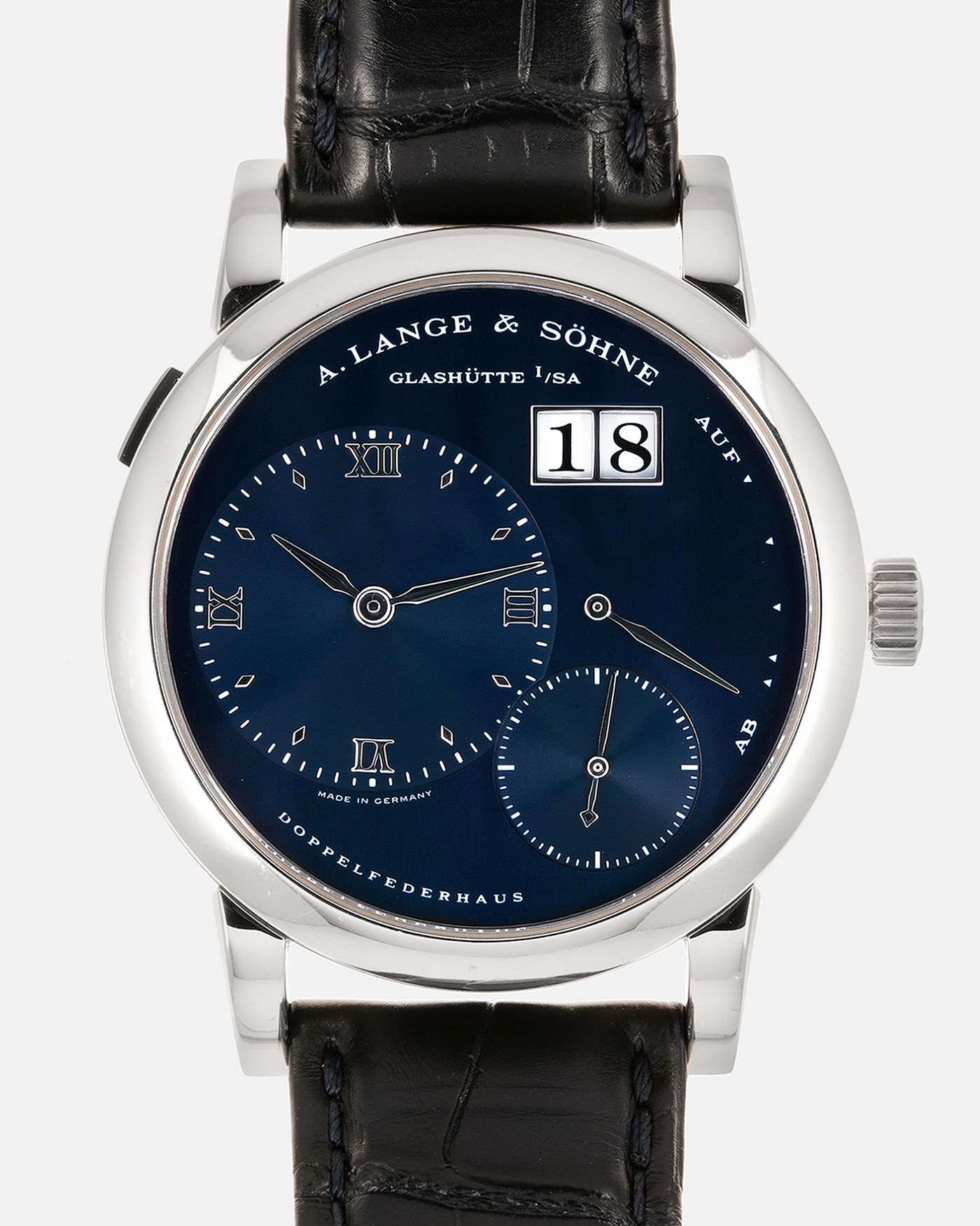 Brand: A. Lange & Söhne Year: 2000’s Model: Lange 1 Reference Number: 101.027 Material: 18-carat White Gold Movement: A. Lange & Söhne Cal. L901.5, Manual Winding Case Diameter: 38.5mm Strap: A. Lange & Söhne Black Alligator Leather Strap with Signed 18-carat White Gold Tang Buckle