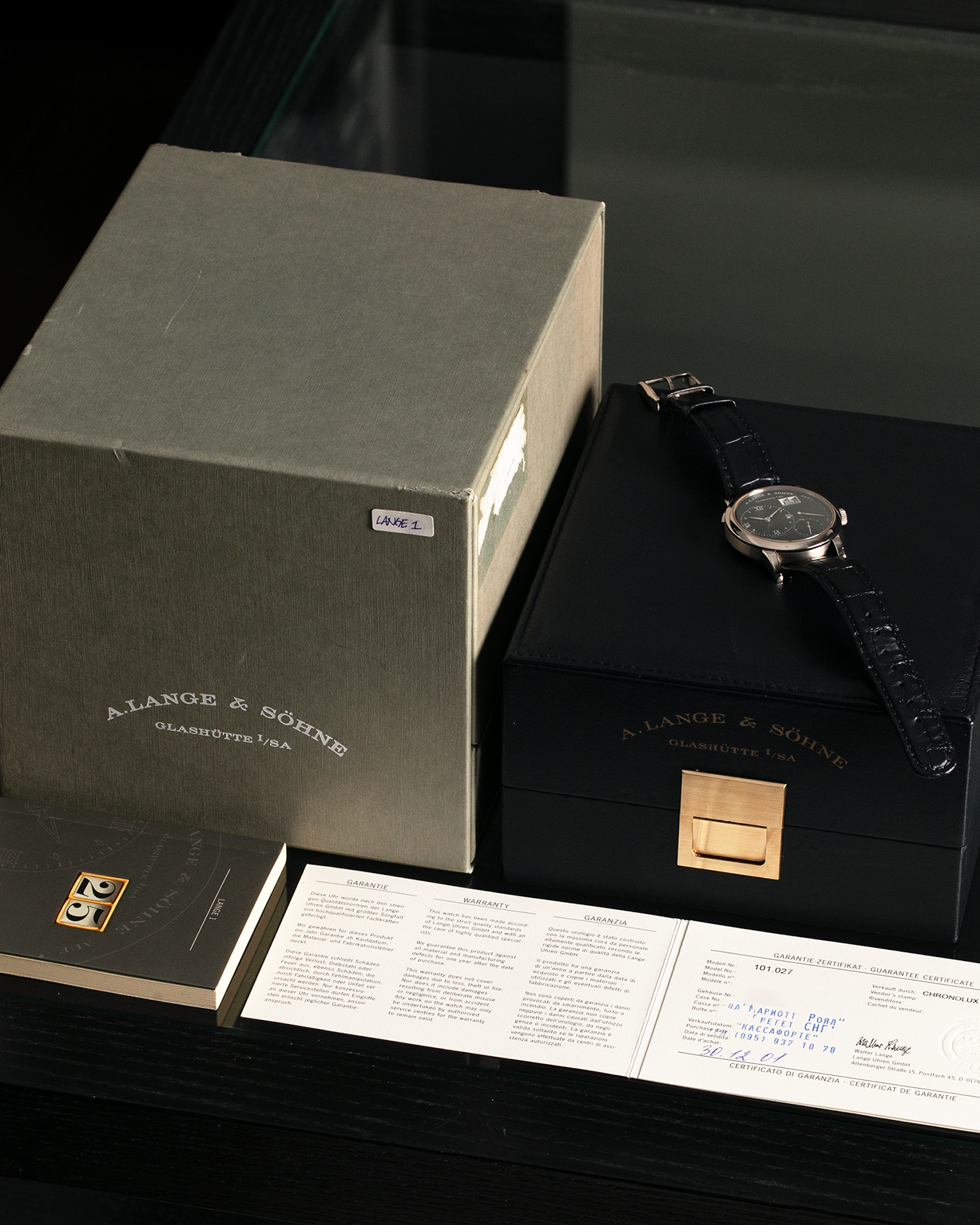 Brand: A. Lange & Söhne Year: 2000’s Model: Lange 1 Reference Number: 101.027 Material: 18-carat White Gold Movement: A. Lange & Söhne Cal. L901.5, Manual Winding Case Diameter: 38.5mm Strap: A. Lange & Söhne Black Alligator Leather Strap with Signed 18-carat White Gold Tang Buckle