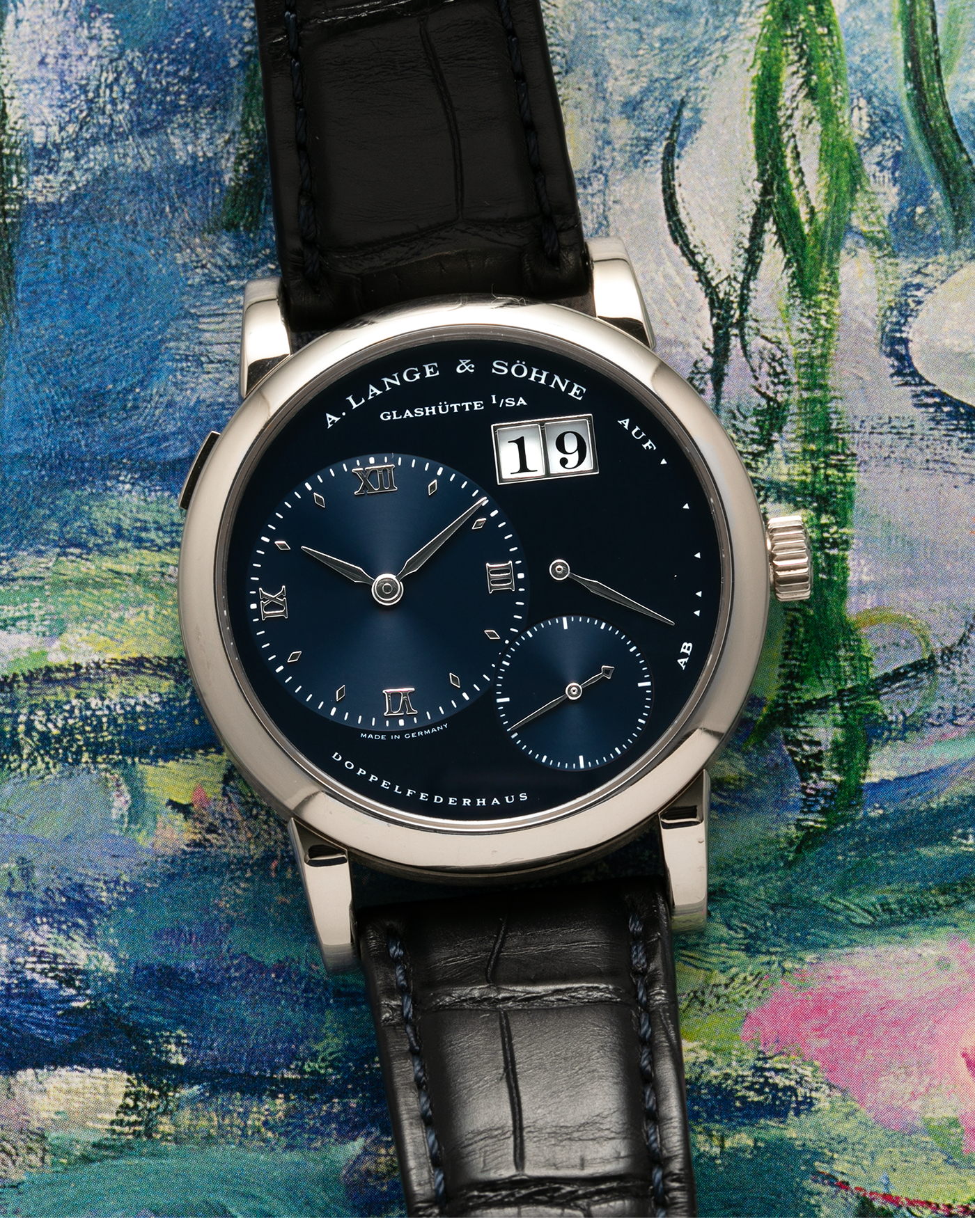 Brand: A. Lange & Söhne Year: 2000’s Model: Lange 1 Reference Number: 101.027 Material: 18-carat White Gold Movement: A. Lange & Söhne Cal. L901.5, Manual Winding Case Diameter: 38.5mm Strap: A. Lange & Söhne Black Alligator Leather Strap with Signed 18-carat White Gold Tang Buckle