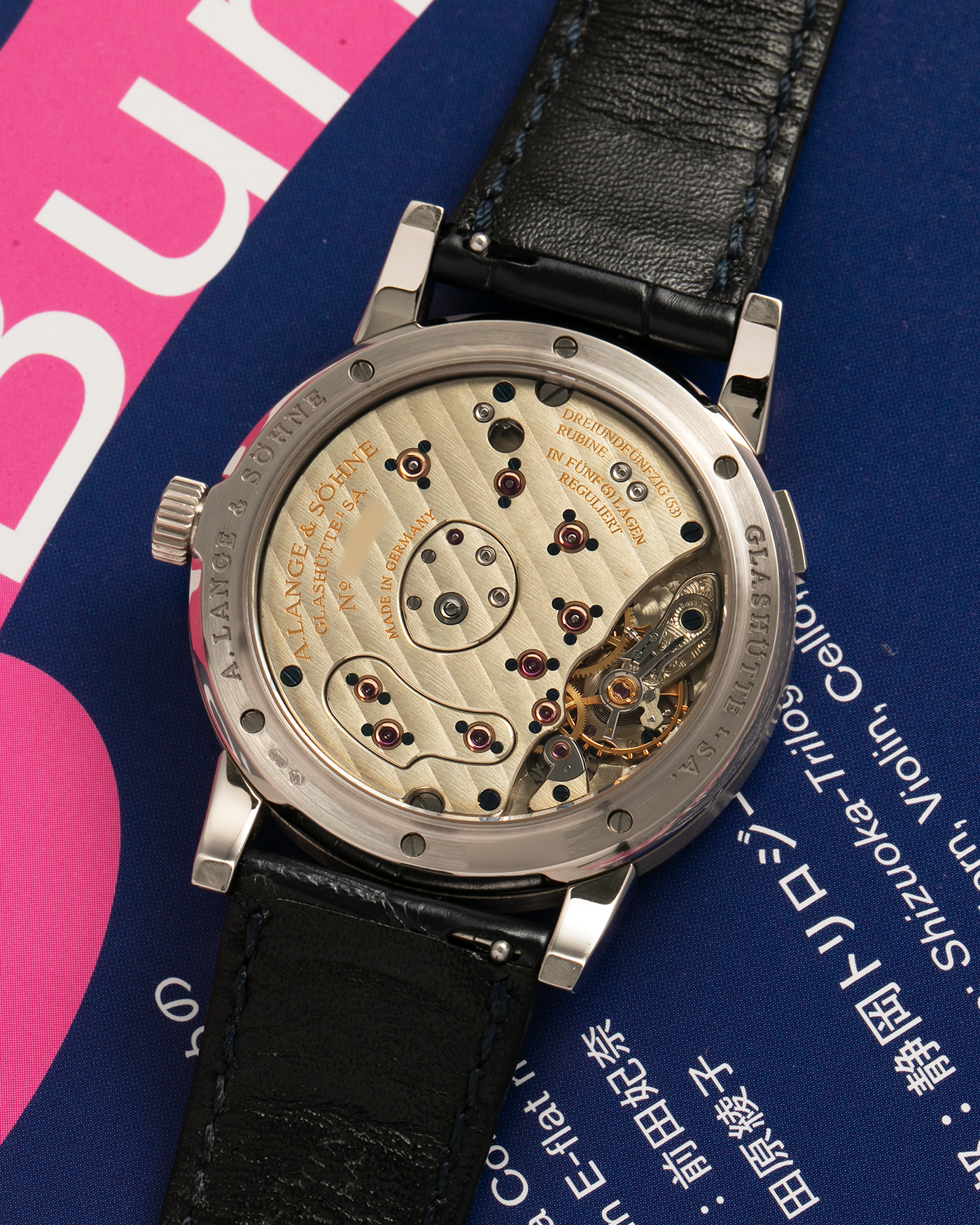 Brand: A. Lange & Söhne Year: 2000’s Model: Lange 1 Reference Number: 101.027 Material: 18-carat White Gold Movement: A. Lange & Söhne Cal. L901.5, Manual Winding Case Diameter: 38.5mm Strap: A. Lange & Söhne Black Alligator Leather Strap with Signed 18-carat White Gold Tang Buckle