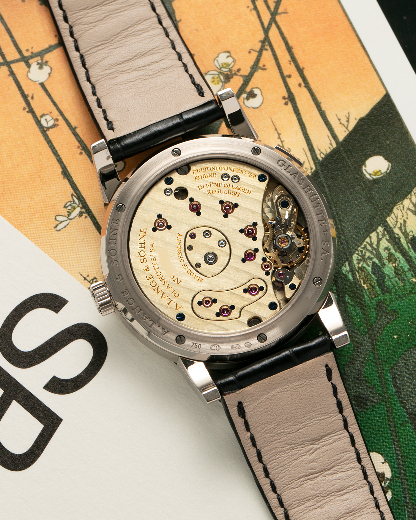 Brand: A. Lange & Söhne
Year: 2010s
Model: Lange 1
Reference: 101.039
Material: 18-carat White Gold
Movement: A. Lange & Söhne Cal. L901.0, Manual-Winding
Case Dimensions: 38.5mm x 9.8mm (Lug-to-Lug 47.3mm)
Lug Width: 20mm
Strap: A. Lange & Söhne Black Alligator Leather Strap with Signed 18-carat White Gold Tang Buckle