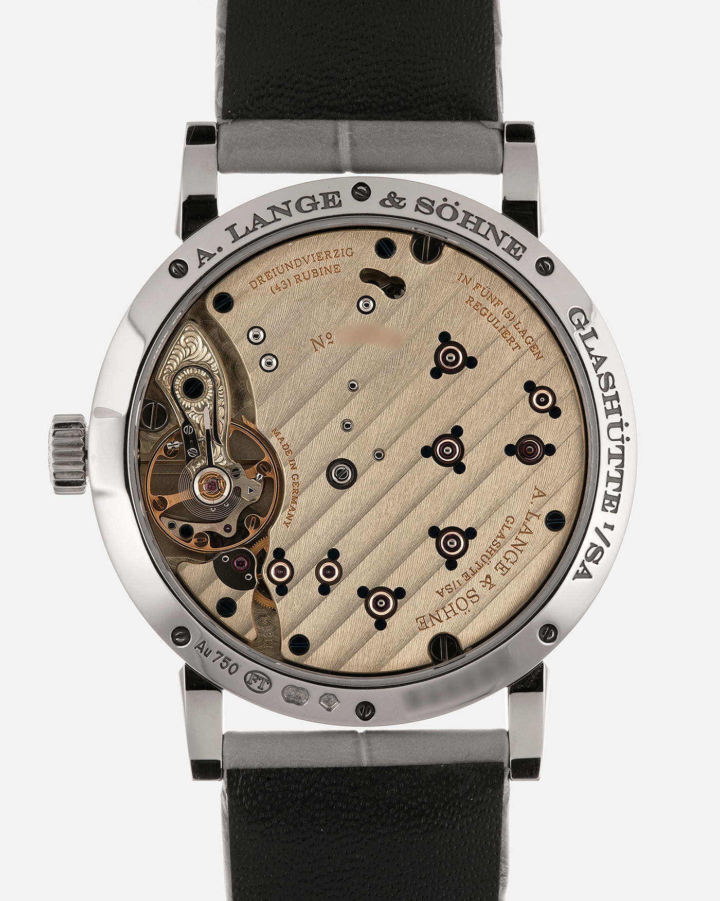 Brand: A. Lange & Söhne
Year: 2021
Model: Little Lange 1 
Reference Number: 181.038
Material: 18-carat White Gold
Movement: A. Lange & Söhne Cal. L121.1, Manual Winding
Case Dimensions: 36.8mm x 9.5mm (Lug-to-Lug 44mm)
Lug Width: 19mm
Strap: A. Lange & Söhne Light Grey Unstitched Alligator Strap with Signed 18-carat White Gold Tang Buckle