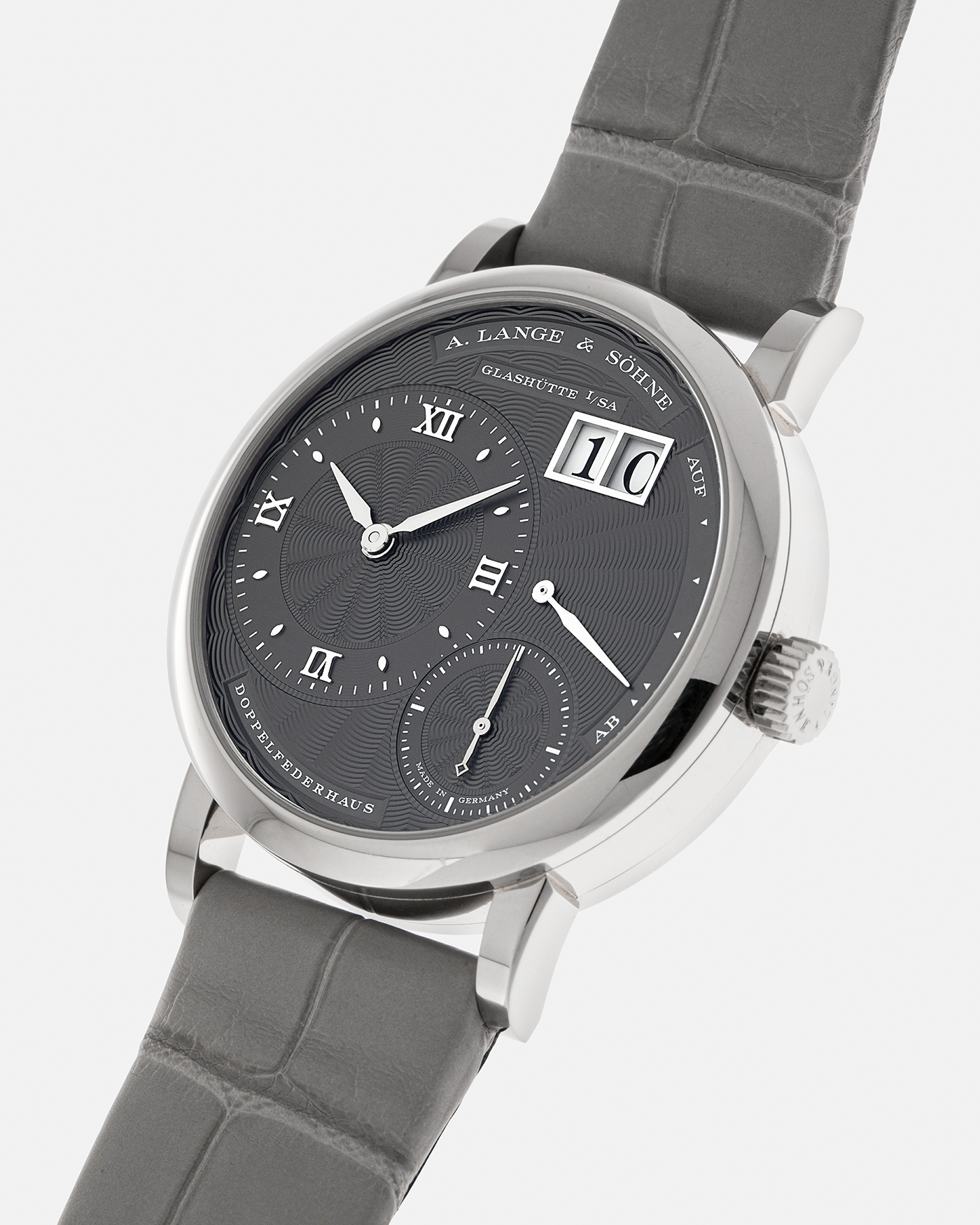 Brand: A. Lange & Söhne
Year: 2021
Model: Little Lange 1 
Reference Number: 181.038
Material: 18-carat White Gold
Movement: A. Lange & Söhne Cal. L121.1, Manual Winding
Case Dimensions: 36.8mm x 9.5mm (Lug-to-Lug 44mm)
Lug Width: 19mm
Strap: A. Lange & Söhne Light Grey Unstitched Alligator Strap with Signed 18-carat White Gold Tang Buckle