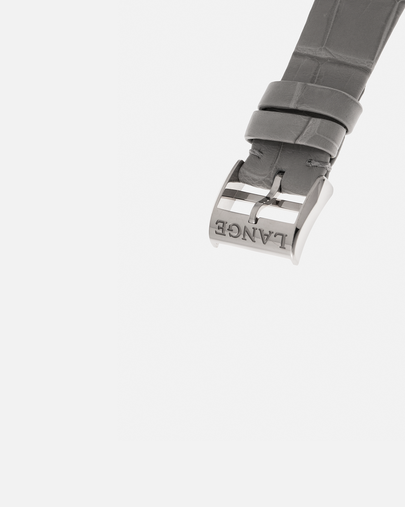 Brand: A. Lange & Söhne
Year: 2021
Model: Little Lange 1 
Reference Number: 181.038
Material: 18-carat White Gold
Movement: A. Lange & Söhne Cal. L121.1, Manual Winding
Case Dimensions: 36.8mm x 9.5mm (Lug-to-Lug 44mm)
Lug Width: 19mm
Strap: A. Lange & Söhne Light Grey Unstitched Alligator Strap with Signed 18-carat White Gold Tang Buckle