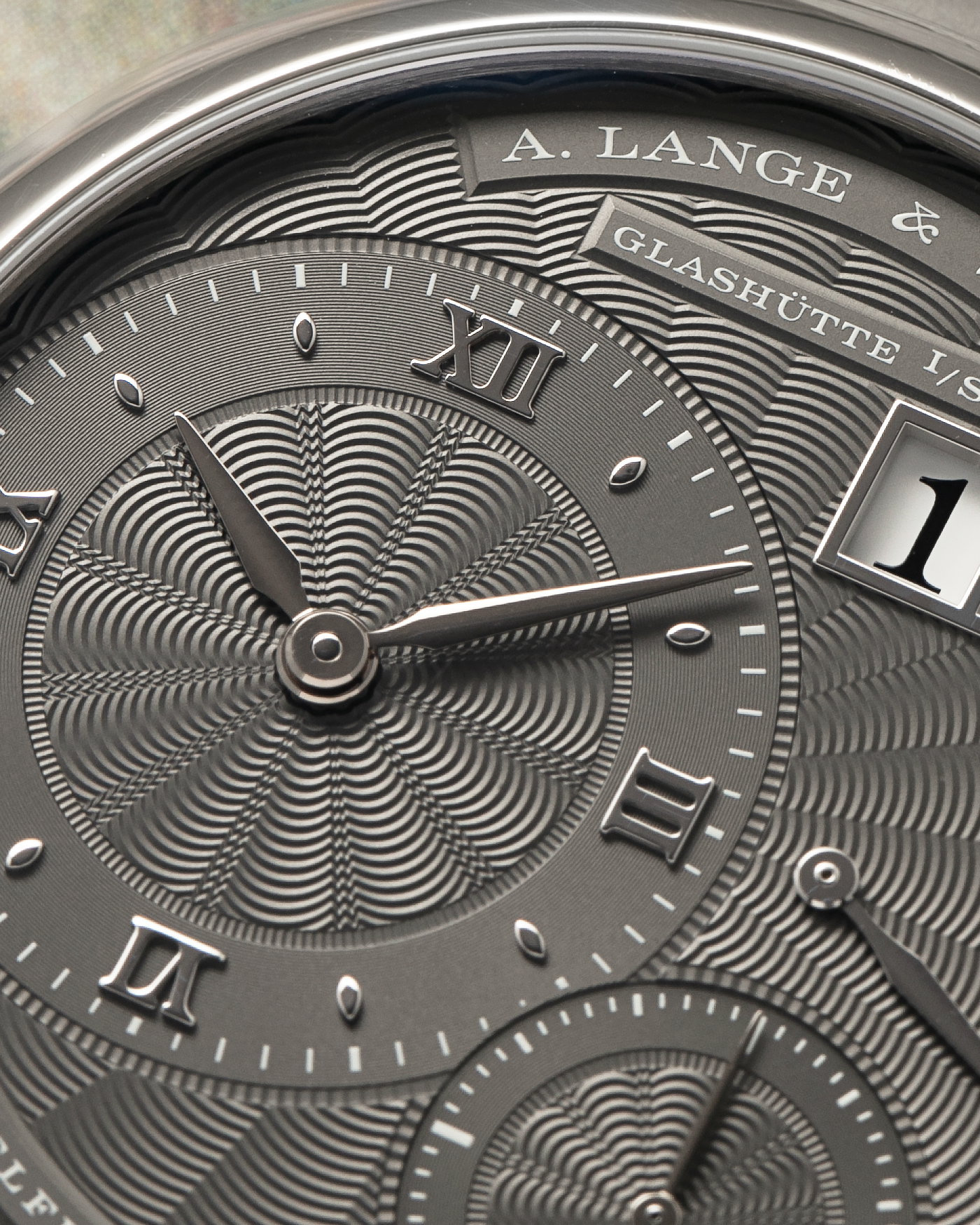 Brand: A. Lange & Söhne
Year: 2021
Model: Little Lange 1 
Reference Number: 181.038
Material: 18-carat White Gold
Movement: A. Lange & Söhne Cal. L121.1, Manual Winding
Case Dimensions: 36.8mm x 9.5mm (Lug-to-Lug 44mm)
Lug Width: 19mm
Strap: A. Lange & Söhne Light Grey Unstitched Alligator Strap with Signed 18-carat White Gold Tang Buckle