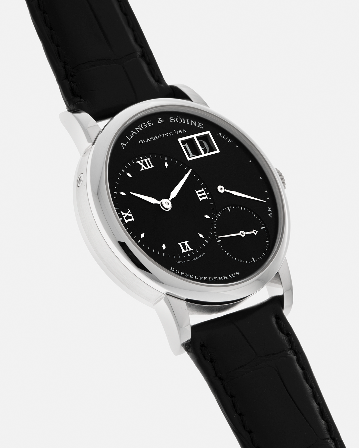 Brand: A. Lange & Söhne
Year: 2005
Model: Little Lange 1 ‘Darth’
Reference: 111.035
Material: Platinum 950
Movement: A. Lange & Söhne Cal. L901.0, Manual Winding
Case Dimensions: 36mm x 10mm (Lug-to-Lug 43mm)
Lug Width: 19mm
Strap: A. Lange & Söhne Black Alligator Leather Strap with Signed Platinum 950 Tang Buckle