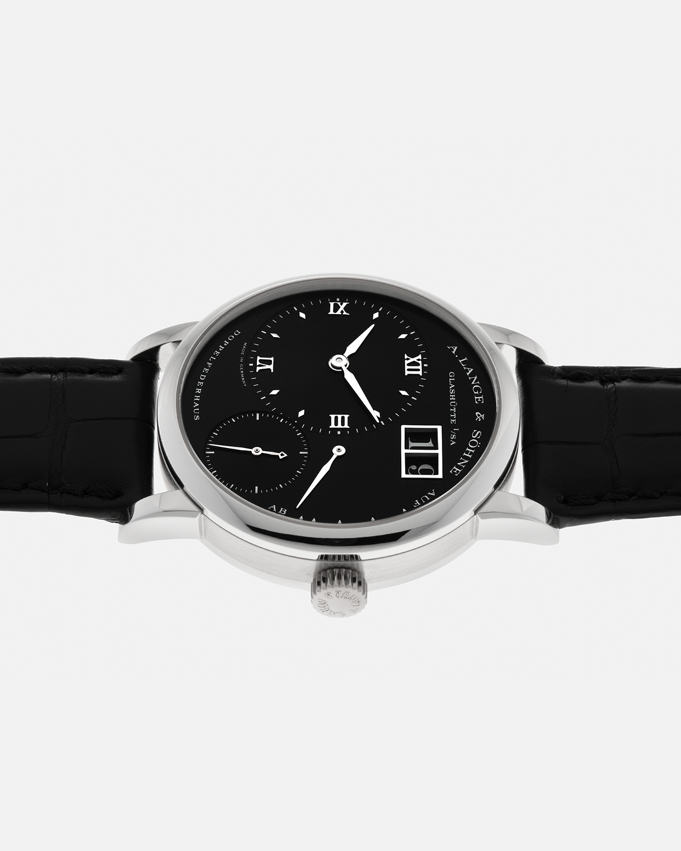 Brand: A. Lange & Söhne
Year: 2005
Model: Little Lange 1 ‘Darth’
Reference: 111.035
Material: Platinum 950
Movement: A. Lange & Söhne Cal. L901.0, Manual Winding
Case Dimensions: 36mm x 10mm (Lug-to-Lug 43mm)
Lug Width: 19mm
Strap: A. Lange & Söhne Black Alligator Leather Strap with Signed Platinum 950 Tang Buckle