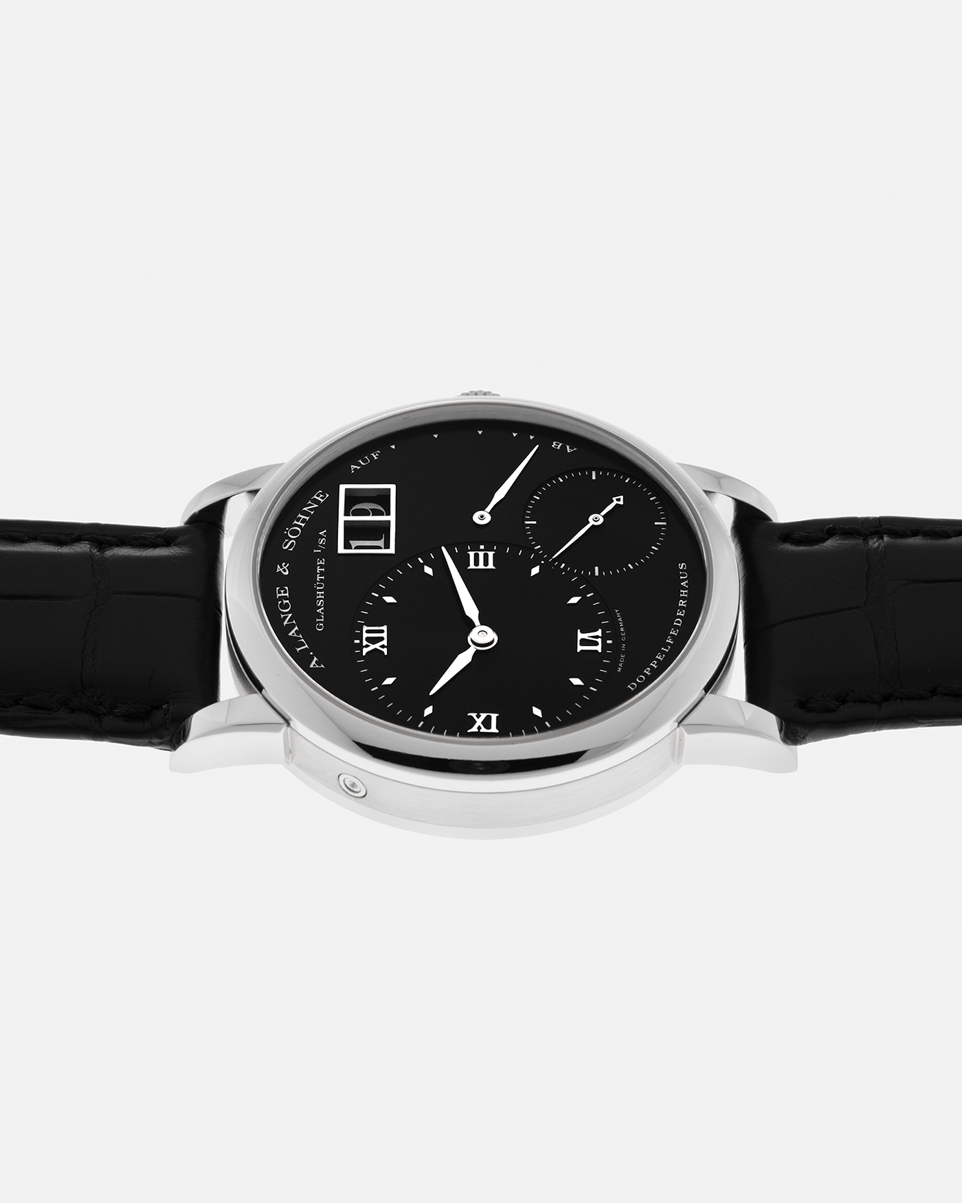 Brand: A. Lange & Söhne
Year: 2005
Model: Little Lange 1 ‘Darth’
Reference: 111.035
Material: Platinum 950
Movement: A. Lange & Söhne Cal. L901.0, Manual Winding
Case Dimensions: 36mm x 10mm (Lug-to-Lug 43mm)
Lug Width: 19mm
Strap: A. Lange & Söhne Black Alligator Leather Strap with Signed Platinum 950 Tang Buckle