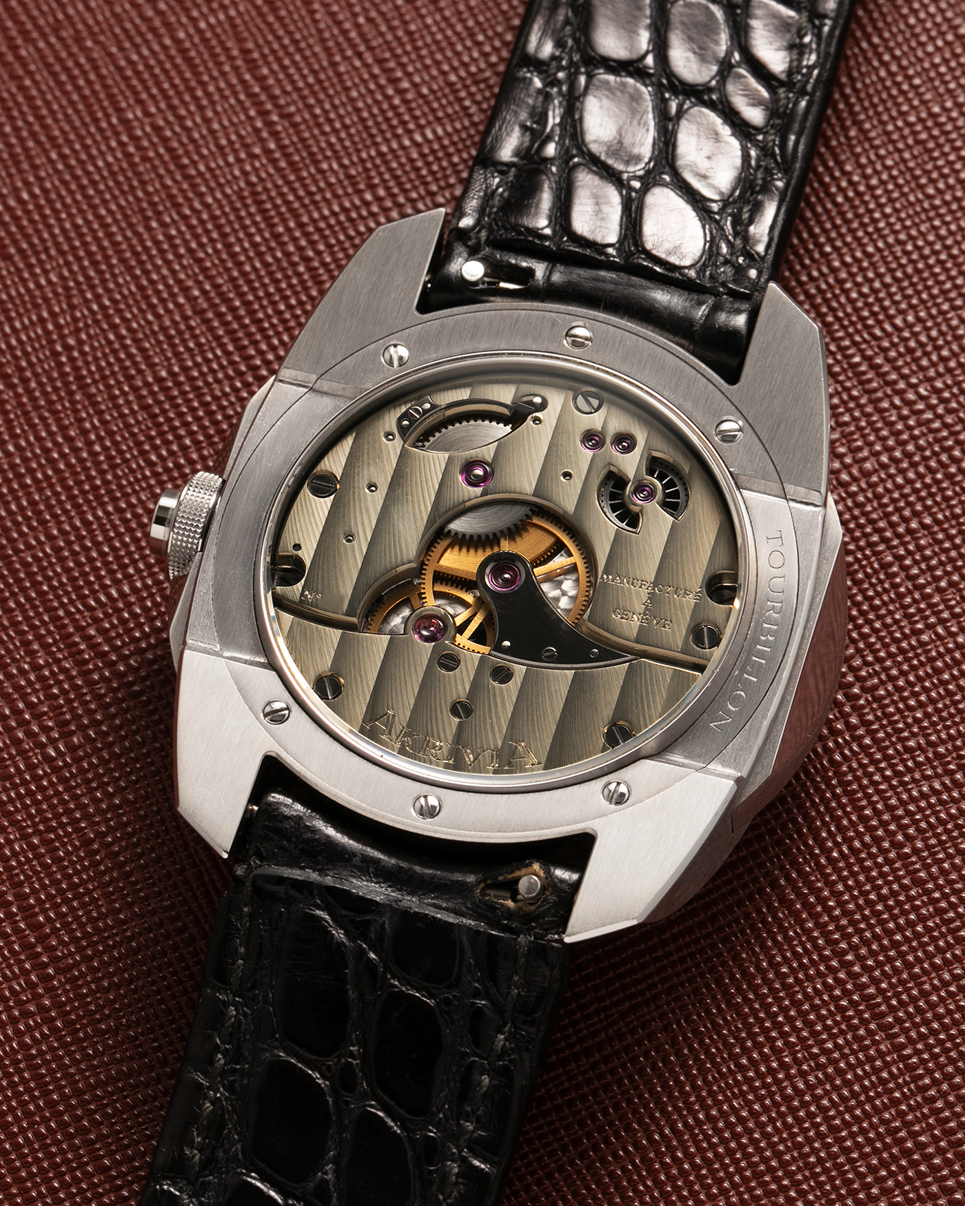 Brand: Akrivia Year: 2016 Model: Tourbillon Chronographe Monopoussoir AK-01 Material: Titanium Movement: Akrivia Cal. AK-01, Manual-Winding Case Dimensions: 42.5mm x 12.9mm (Lug-to-Lug 50mm) Lug Width: 21mm Strap: Akrivia Black Textured Calf Leather Strap with Signed Titanium Tang Buckle