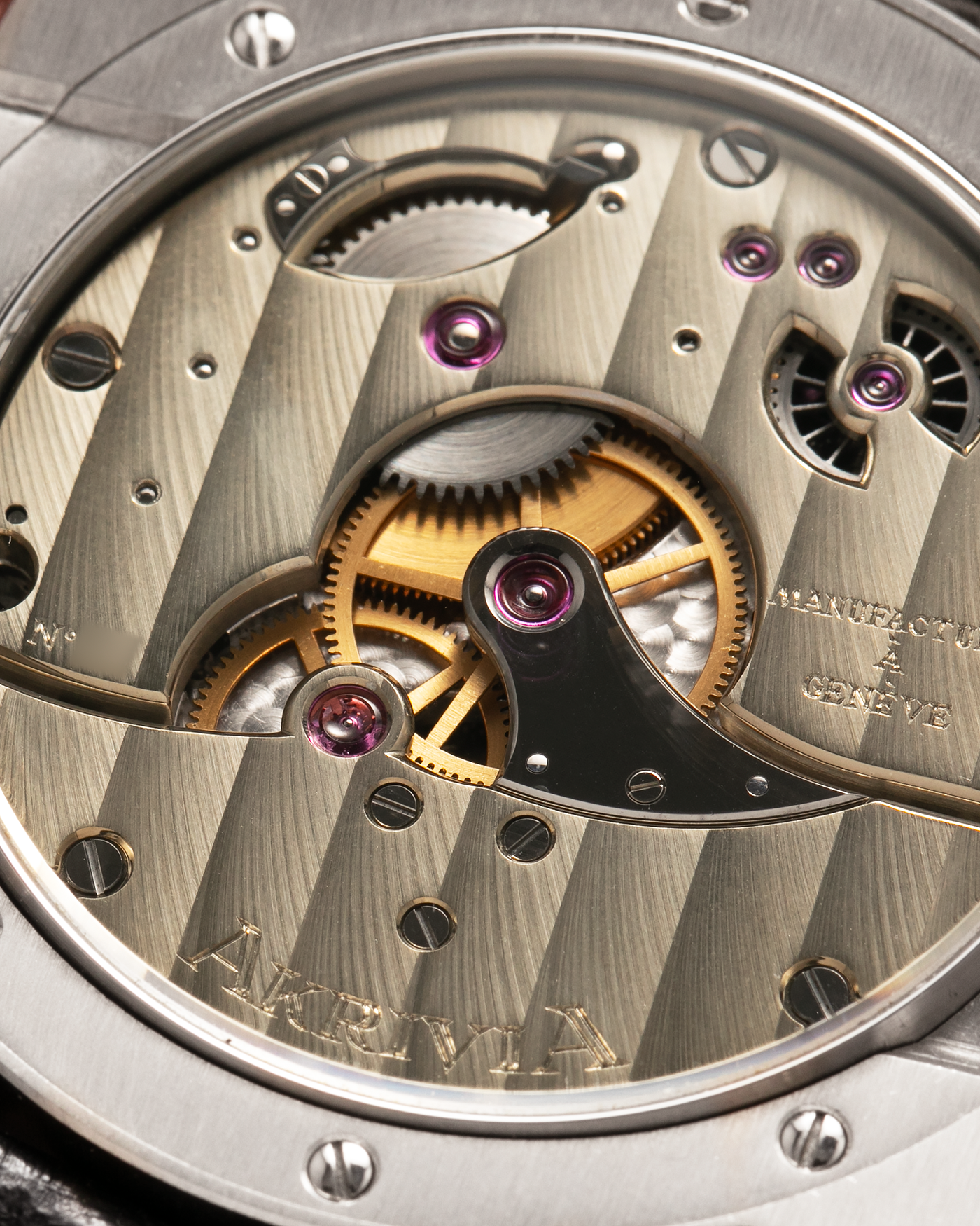 Brand: Akrivia Year: 2016 Model: Tourbillon Chronographe Monopoussoir AK-01 Material: Titanium Movement: Akrivia Cal. AK-01, Manual-Winding Case Dimensions: 42.5mm x 12.9mm (Lug-to-Lug 50mm) Lug Width: 21mm Strap: Akrivia Black Textured Calf Leather Strap with Signed Titanium Tang Buckle