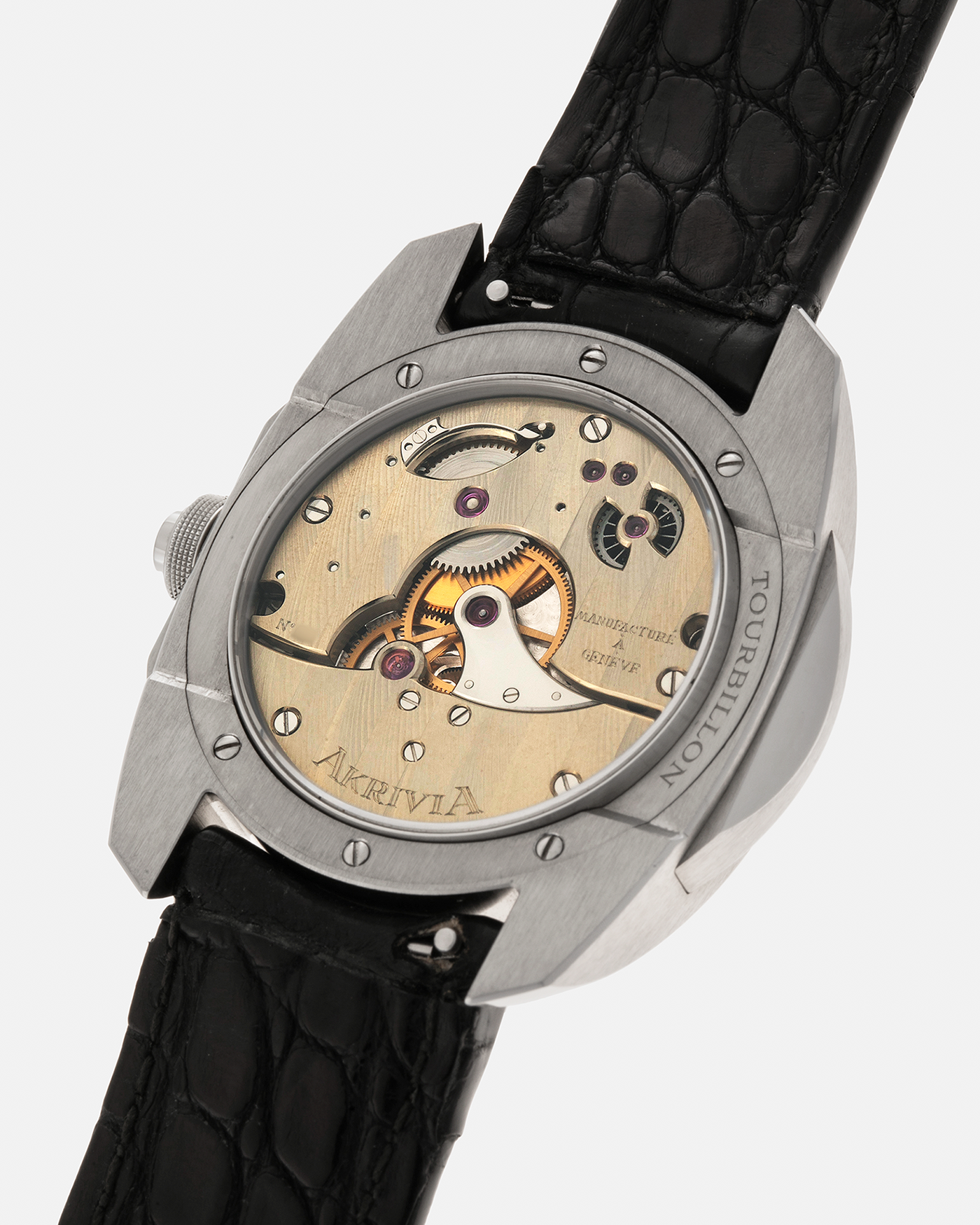 Brand: Akrivia Year: 2016 Model: Tourbillon Chronographe Monopoussoir AK-01 Material: Titanium Movement: Akrivia Cal. AK-01, Manual-Winding Case Dimensions: 42.5mm x 12.9mm (Lug-to-Lug 50mm) Lug Width: 21mm Strap: Akrivia Black Textured Calf Leather Strap with Signed Titanium Tang Buckle