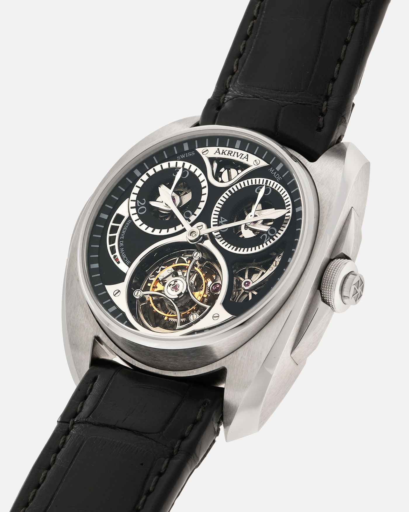 Brand: Akrivia Year: 2016 Model: Tourbillon Chronographe Monopoussoir AK-01 Material: Titanium Movement: Akrivia Cal. AK-01, Manual-Winding Case Dimensions: 42.5mm x 12.9mm (Lug-to-Lug 50mm) Lug Width: 21mm Strap: Akrivia Black Textured Calf Leather Strap with Signed Titanium Tang Buckle