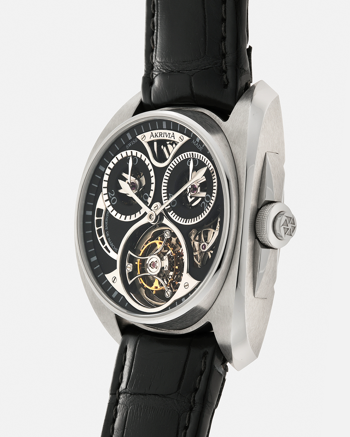 Brand: Akrivia Year: 2016 Model: Tourbillon Chronographe Monopoussoir AK-01 Material: Titanium Movement: Akrivia Cal. AK-01, Manual-Winding Case Dimensions: 42.5mm x 12.9mm (Lug-to-Lug 50mm) Lug Width: 21mm Strap: Akrivia Black Textured Calf Leather Strap with Signed Titanium Tang Buckle