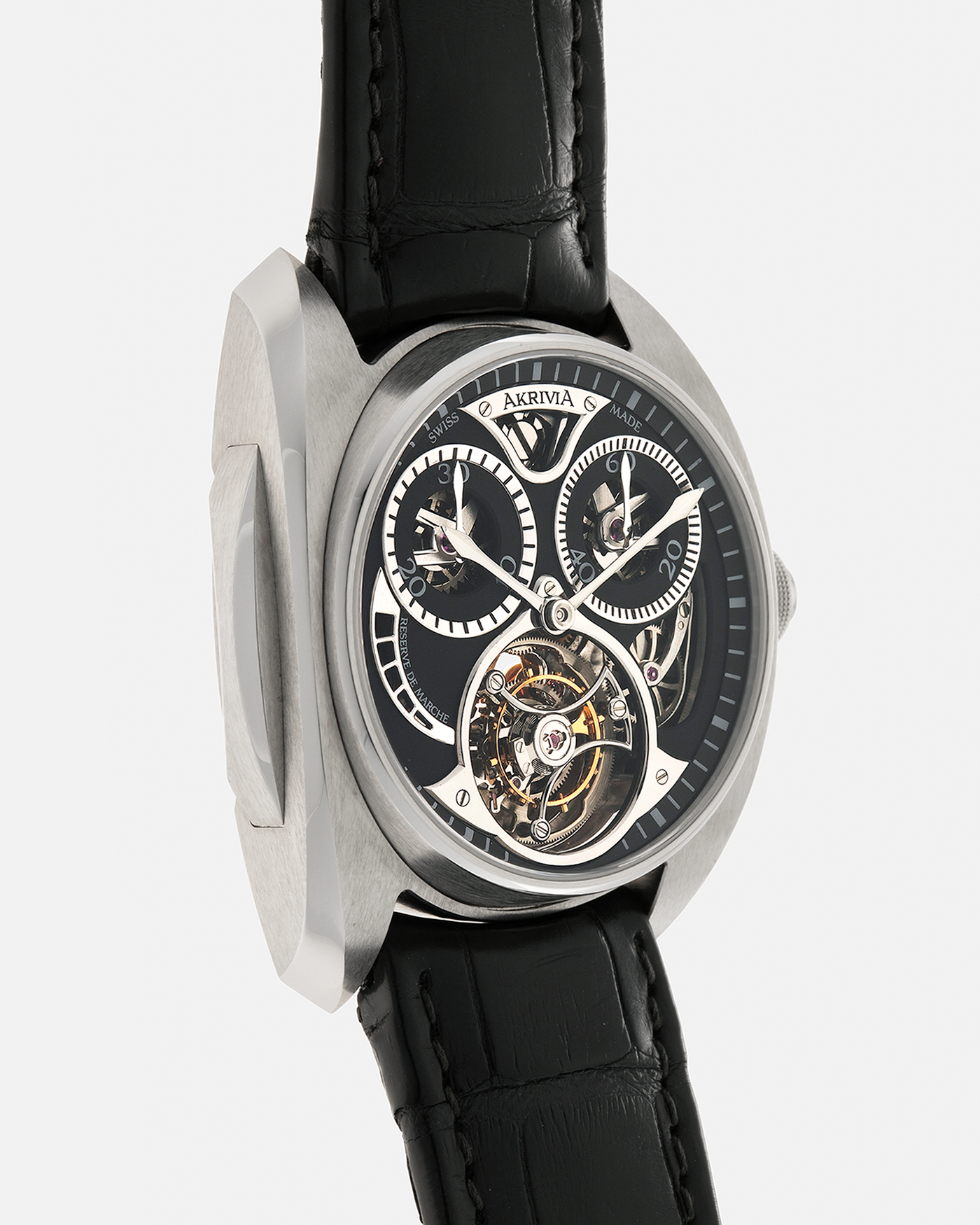 Brand: Akrivia Year: 2016 Model: Tourbillon Chronographe Monopoussoir AK-01 Material: Titanium Movement: Akrivia Cal. AK-01, Manual-Winding Case Dimensions: 42.5mm x 12.9mm (Lug-to-Lug 50mm) Lug Width: 21mm Strap: Akrivia Black Textured Calf Leather Strap with Signed Titanium Tang Buckle