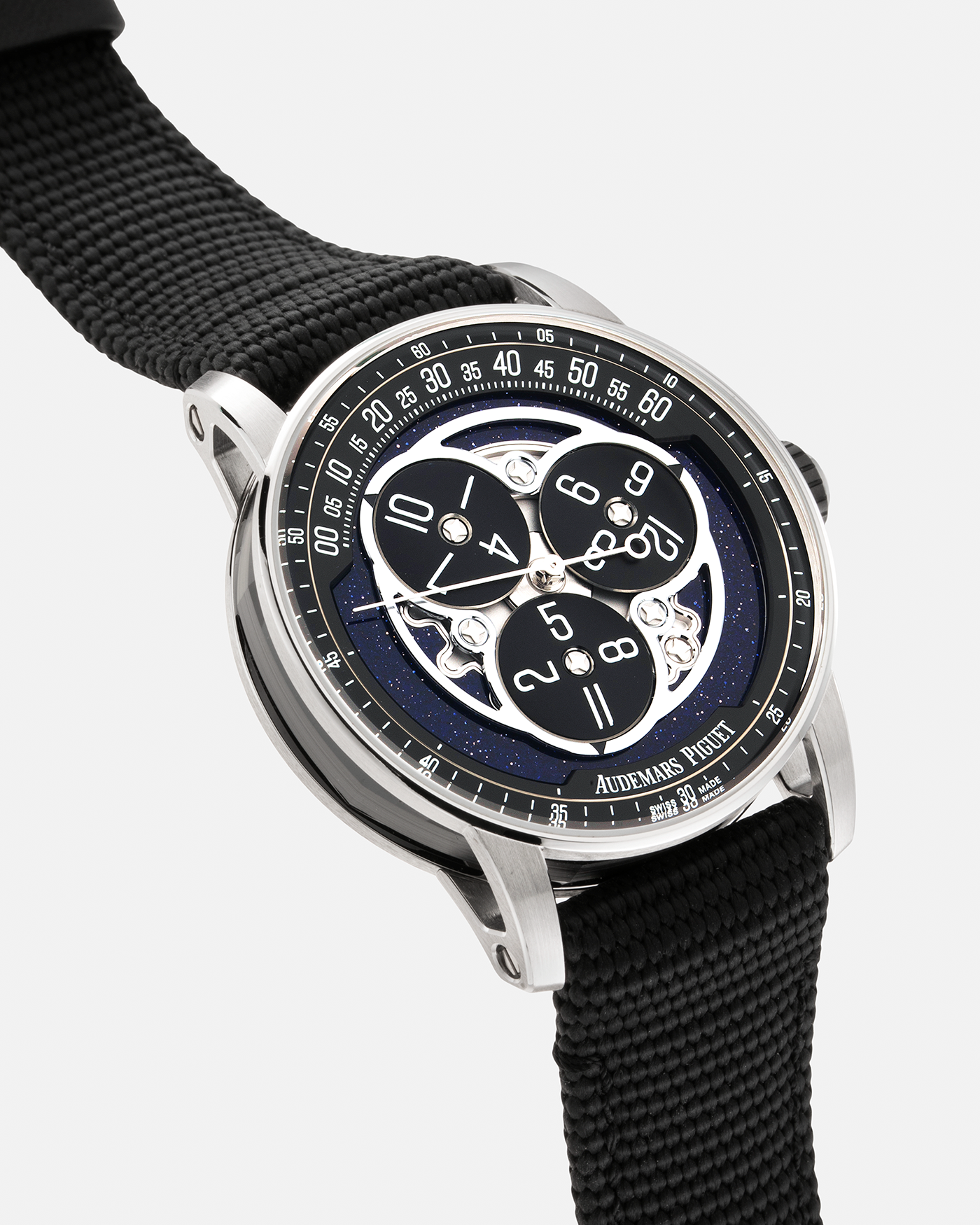 Brand: Audemars Piguet Year: 2023 Model: Code 11.59 ‘Star Wheel’ Reference Number: 15212NB.OO.A002KB.01 Material: Black Ceramic Case, 18-carat White Gold Bezel, Second-Hand, Lugs and Caseback, Blue Aventurine Dial, Black Opaline Aluminium Discs   Movement: Audemars Piguet Cal. 4310, Self-Winding Case Dimensions: 41mm x 10.7mm Strap: Audemars Piguet Textured Black Rubber-Coated Strap with Signed 18-carat White Gold Tang Buckle