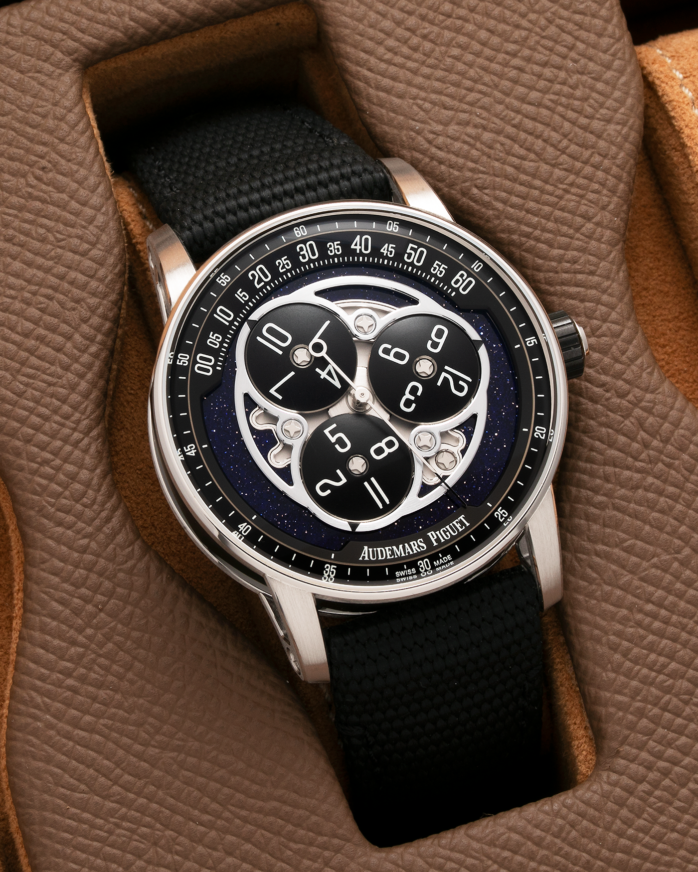 Brand: Audemars Piguet Year: 2023 Model: Code 11.59 ‘Star Wheel’ Reference Number: 15212NB.OO.A002KB.01 Material: Black Ceramic Case, 18-carat White Gold Bezel, Second-Hand, Lugs and Caseback, Blue Aventurine Dial, Black Opaline Aluminium Discs   Movement: Audemars Piguet Cal. 4310, Self-Winding Case Dimensions: 41mm x 10.7mm Strap: Audemars Piguet Textured Black Rubber-Coated Strap with Signed 18-carat White Gold Tang Buckle