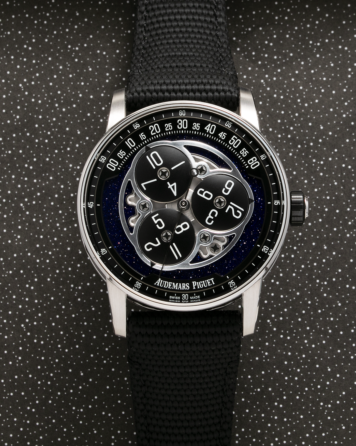 Brand: Audemars Piguet Year: 2023 Model: Code 11.59 ‘Star Wheel’ Reference Number: 15212NB.OO.A002KB.01 Material: Black Ceramic Case, 18-carat White Gold Bezel, Second-Hand, Lugs and Caseback, Blue Aventurine Dial, Black Opaline Aluminium Discs   Movement: Audemars Piguet Cal. 4310, Self-Winding Case Dimensions: 41mm x 10.7mm Strap: Audemars Piguet Textured Black Rubber-Coated Strap with Signed 18-carat White Gold Tang Buckle