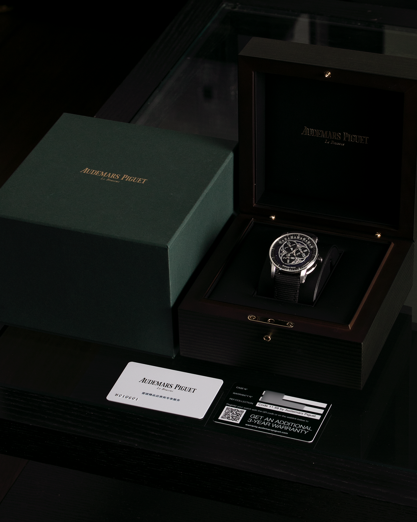 Brand: Audemars Piguet Year: 2023 Model: Code 11.59 ‘Star Wheel’ Reference Number: 15212NB.OO.A002KB.01 Material: Black Ceramic Case, 18-carat White Gold Bezel, Second-Hand, Lugs and Caseback, Blue Aventurine Dial, Black Opaline Aluminium Discs   Movement: Audemars Piguet Cal. 4310, Self-Winding Case Dimensions: 41mm x 10.7mm Strap: Audemars Piguet Textured Black Rubber-Coated Strap with Signed 18-carat White Gold Tang Buckle