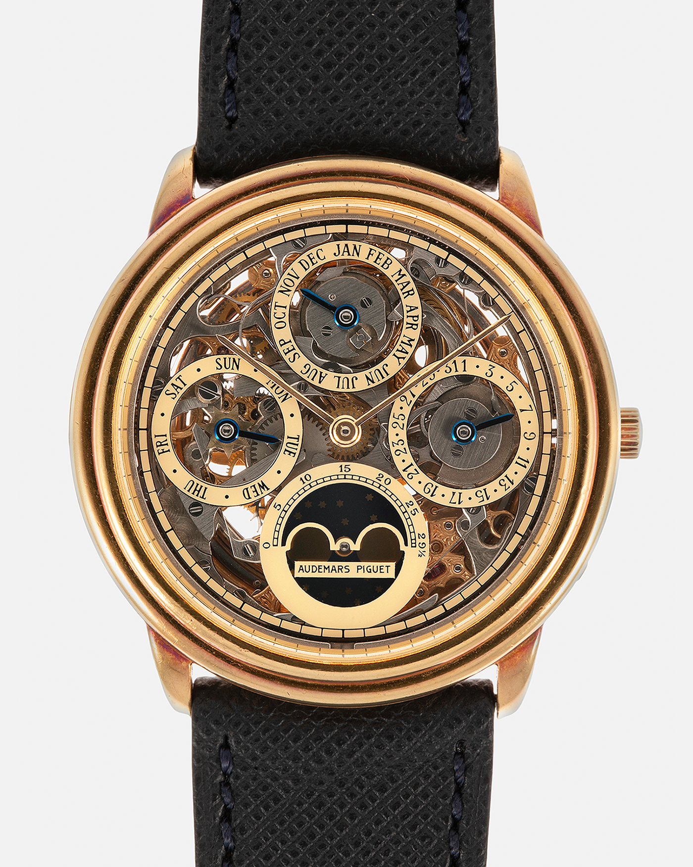 Brand: Audemars Piguet Year: 1980’s Model: Quantieme Perpetual Calendar Openworked Reference Number: 25668BA Material: 18-carat Yellow Gold Movement: Audemars Piguet Cal. 2120/2800, Self-Winding Case Dimensions: 36mm x 8mm (Lug-to-Lug 37mm) Lug Width: 20mm Strap: Molequin Dark Navy Textured Calf Leather Strap with Signed 18-carat Yellow Gold Tang Buckle