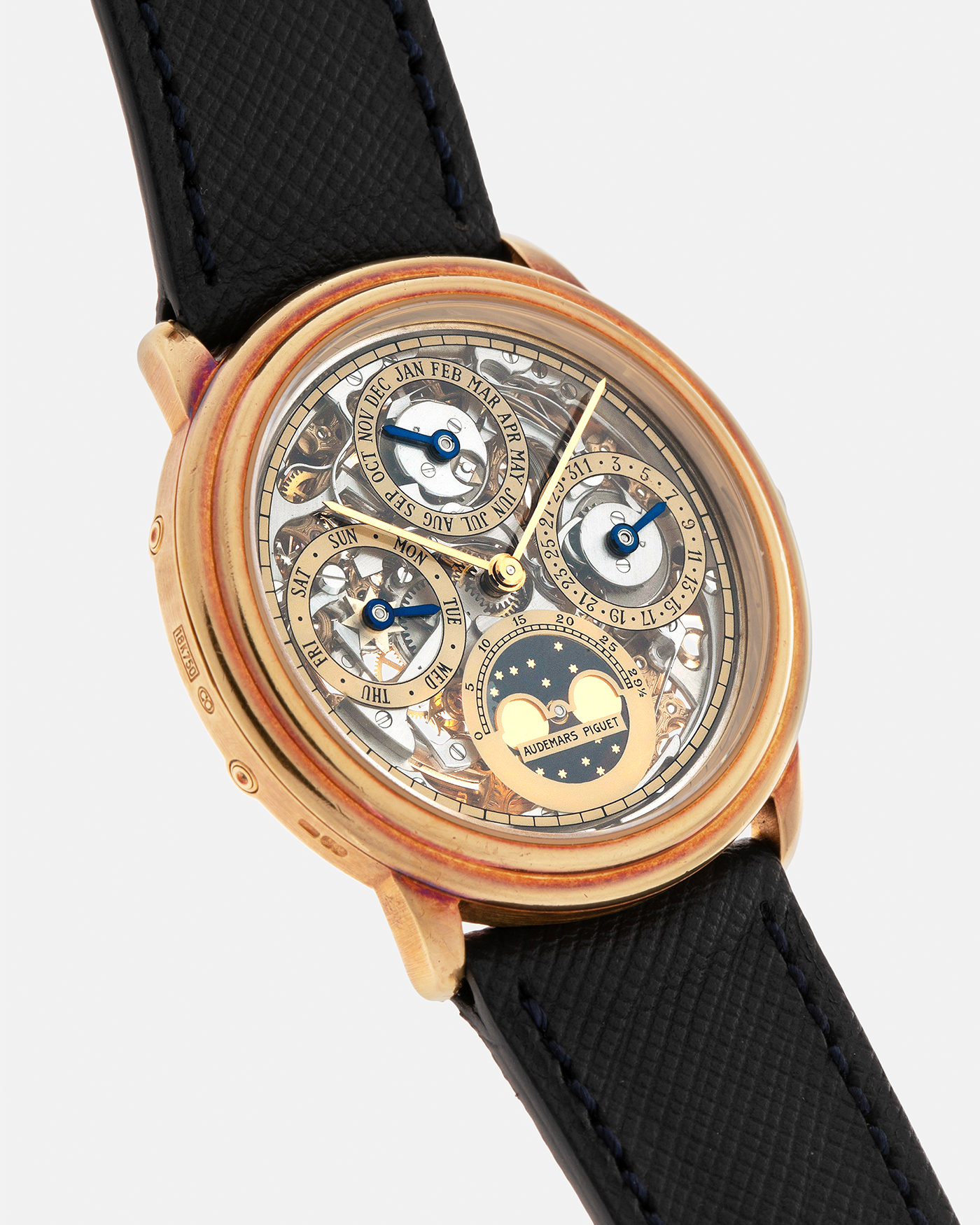 Brand: Audemars Piguet Year: 1980’s Model: Quantieme Perpetual Calendar Openworked Reference Number: 25668BA Material: 18-carat Yellow Gold Movement: Audemars Piguet Cal. 2120/2800, Self-Winding Case Dimensions: 36mm x 8mm (Lug-to-Lug 37mm) Lug Width: 20mm Strap: Molequin Dark Navy Textured Calf Leather Strap with Signed 18-carat Yellow Gold Tang Buckle