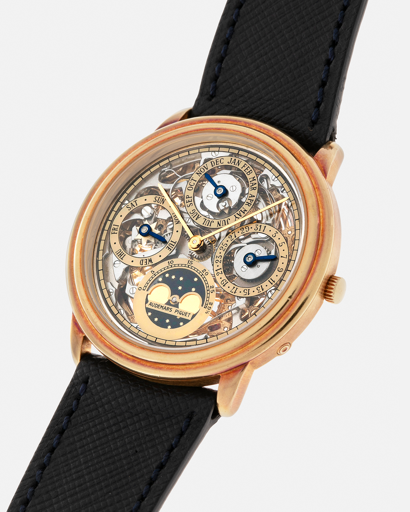 Brand: Audemars Piguet Year: 1980’s Model: Quantieme Perpetual Calendar Openworked Reference Number: 25668BA Material: 18-carat Yellow Gold Movement: Audemars Piguet Cal. 2120/2800, Self-Winding Case Dimensions: 36mm x 8mm (Lug-to-Lug 37mm) Lug Width: 20mm Strap: Molequin Dark Navy Textured Calf Leather Strap with Signed 18-carat Yellow Gold Tang Buckle