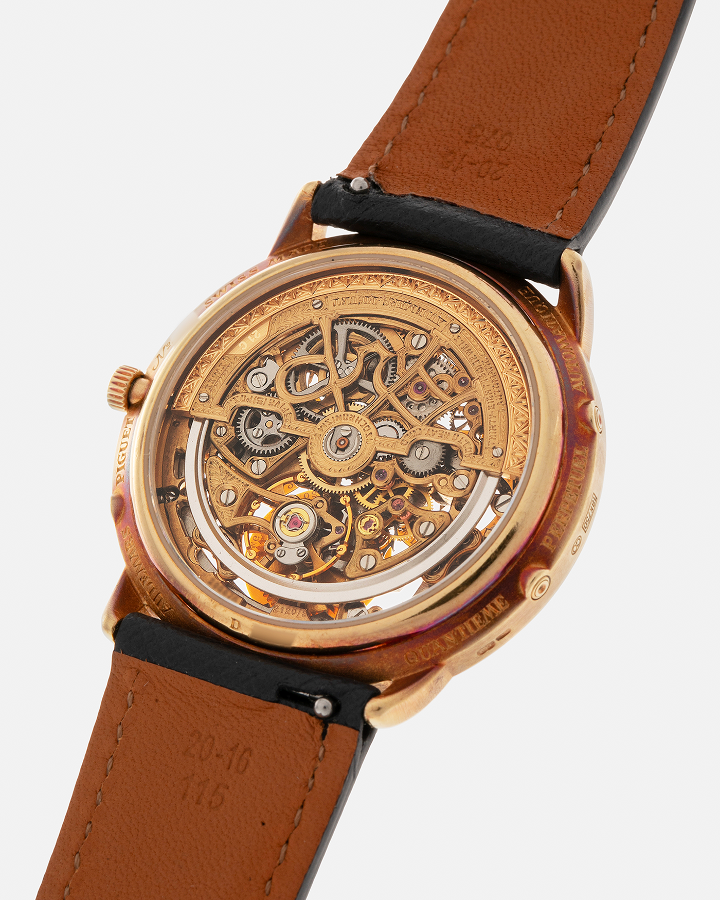 Brand: Audemars Piguet Year: 1980’s Model: Quantieme Perpetual Calendar Openworked Reference Number: 25668BA Material: 18-carat Yellow Gold Movement: Audemars Piguet Cal. 2120/2800, Self-Winding Case Dimensions: 36mm x 8mm (Lug-to-Lug 37mm) Lug Width: 20mm Strap: Molequin Dark Navy Textured Calf Leather Strap with Signed 18-carat Yellow Gold Tang Buckle