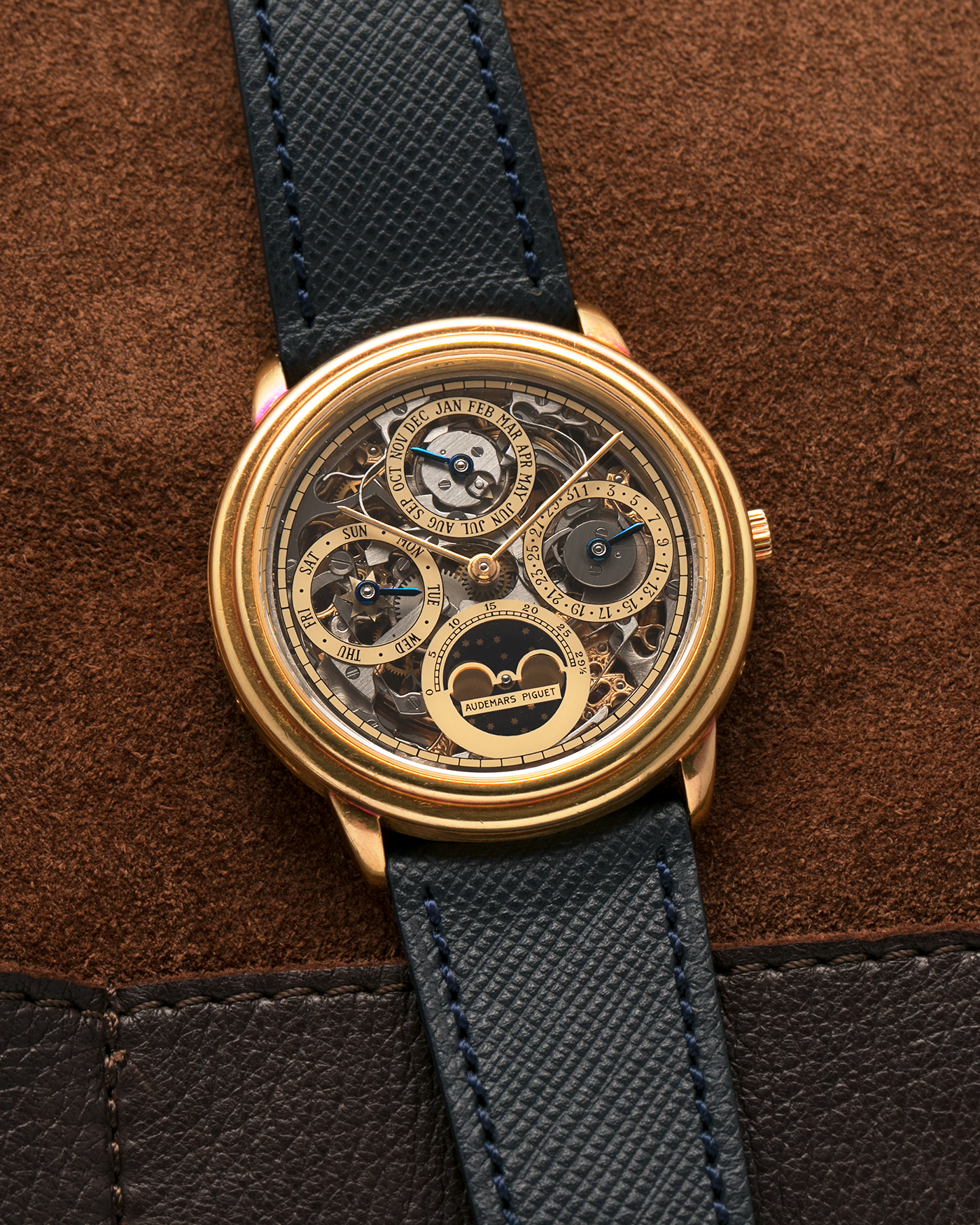 Brand: Audemars Piguet Year: 1980’s Model: Quantieme Perpetual Calendar Openworked Reference Number: 25668BA Material: 18-carat Yellow Gold Movement: Audemars Piguet Cal. 2120/2800, Self-Winding Case Dimensions: 36mm x 8mm (Lug-to-Lug 37mm) Lug Width: 20mm Strap: Molequin Dark Navy Textured Calf Leather Strap with Signed 18-carat Yellow Gold Tang Buckle
