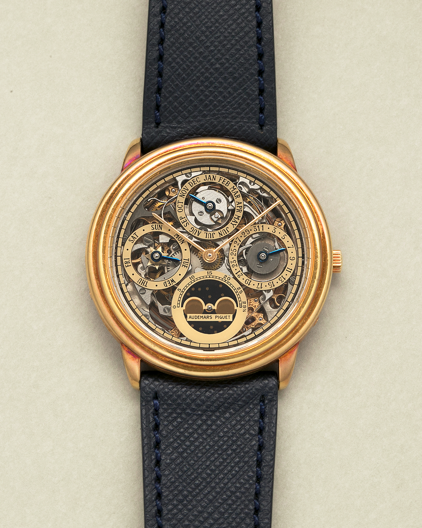 Brand: Audemars Piguet Year: 1980’s Model: Quantieme Perpetual Calendar Openworked Reference Number: 25668BA Material: 18-carat Yellow Gold Movement: Audemars Piguet Cal. 2120/2800, Self-Winding Case Dimensions: 36mm x 8mm (Lug-to-Lug 37mm) Lug Width: 20mm Strap: Molequin Dark Navy Textured Calf Leather Strap with Signed 18-carat Yellow Gold Tang Buckle