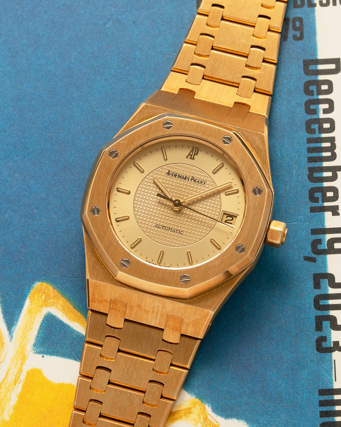 Brand: Audemars Piguet
Year: 1992
Model: Royal Oak ‘Nick Faldo’
Reference: 15090BA
Material: 18-carat Yellow Gold
Movement: Audemars Piguet Cal. 2225 (Derived from JLC Cal. 889), Self-Winding
Case Dimensions: 36mm x 8mm (Lug-to-Lug 46mm)
Bracelet: Audemars Piguet Integrated Bracelet in 18-carat Yellow Gold with Signed Folding Clasp