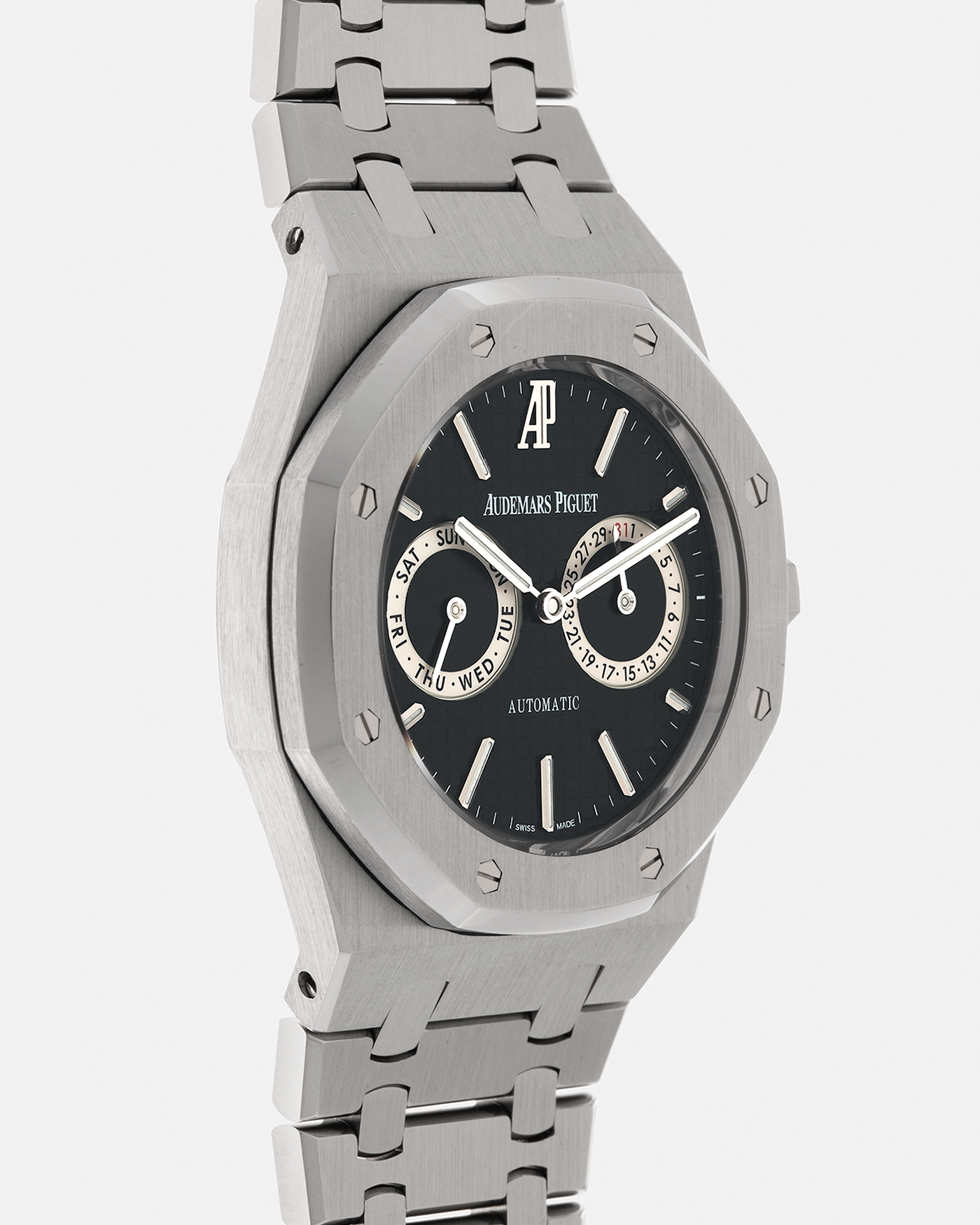 Brand: Audemars Piguet
Year: 2012
Model: Royal Oak Day Date
Reference: 26330ST.OO.1220ST.01.A
Material: Stainless Steel
Movement: Audemars Piguet Cal 2324/2810 (Derived from JLC Cal. 889), Self-Winding
Case Dimensions: 39mm x 10.5 (Lug-to-Lug 49mm)
Bracelet: Audemars Piguet Stainless Steel Integrated Bracelet