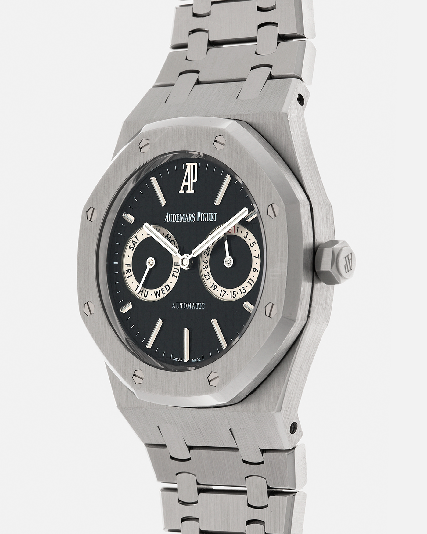 Brand: Audemars Piguet
Year: 2012
Model: Royal Oak Day Date
Reference: 26330ST.OO.1220ST.01.A
Material: Stainless Steel
Movement: Audemars Piguet Cal 2324/2810 (Derived from JLC Cal. 889), Self-Winding
Case Dimensions: 39mm x 10.5 (Lug-to-Lug 49mm)
Bracelet: Audemars Piguet Stainless Steel Integrated Bracelet