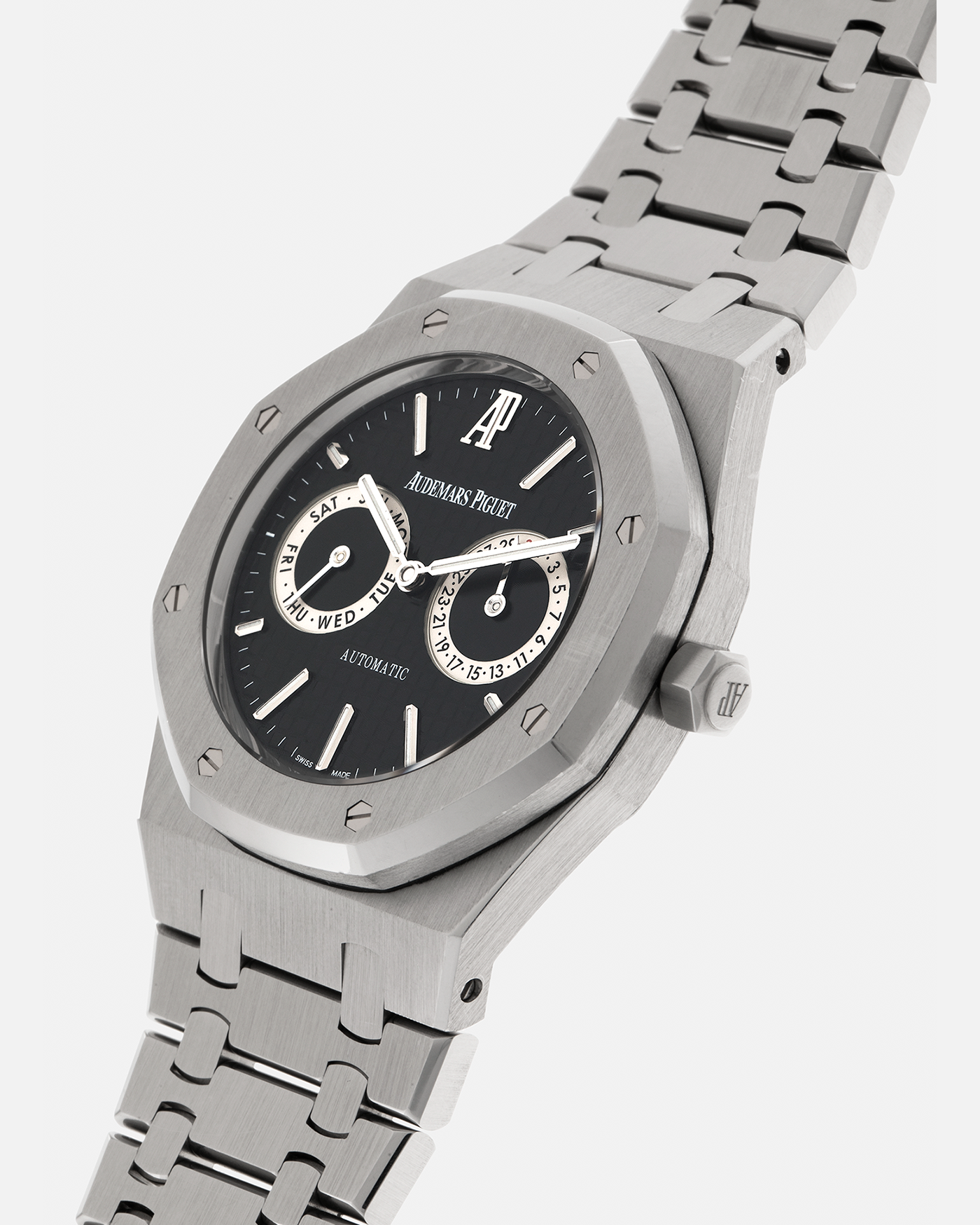 Brand: Audemars Piguet
Year: 2012
Model: Royal Oak Day Date
Reference: 26330ST.OO.1220ST.01.A
Material: Stainless Steel
Movement: Audemars Piguet Cal 2324/2810 (Derived from JLC Cal. 889), Self-Winding
Case Dimensions: 39mm x 10.5 (Lug-to-Lug 49mm)
Bracelet: Audemars Piguet Stainless Steel Integrated Bracelet