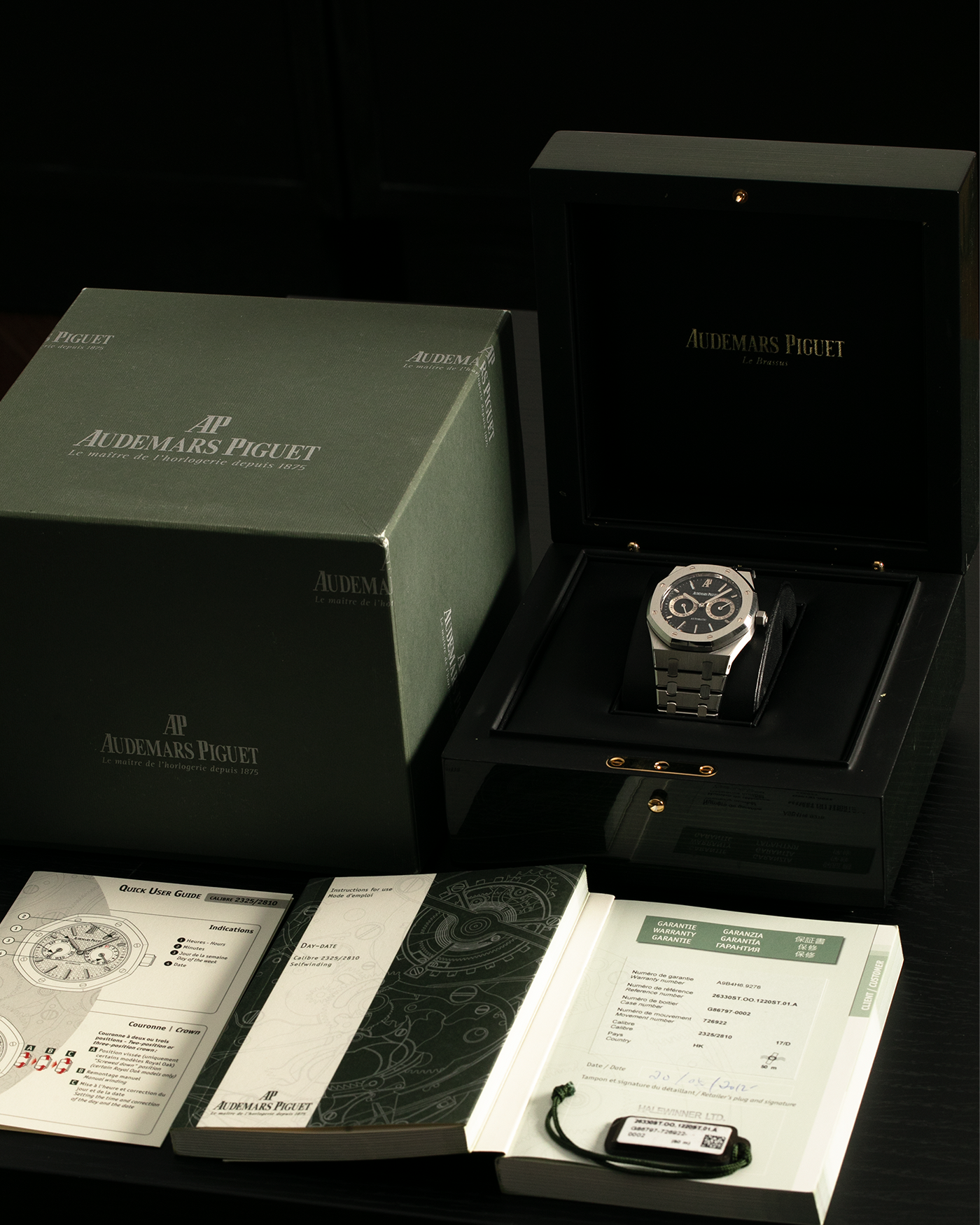 Brand: Audemars Piguet
Year: 2012
Model: Royal Oak Day Date
Reference: 26330ST.OO.1220ST.01.A
Material: Stainless Steel
Movement: Audemars Piguet Cal 2324/2810 (Derived from JLC Cal. 889), Self-Winding
Case Dimensions: 39mm x 10.5 (Lug-to-Lug 49mm)
Bracelet: Audemars Piguet Stainless Steel Integrated Bracelet