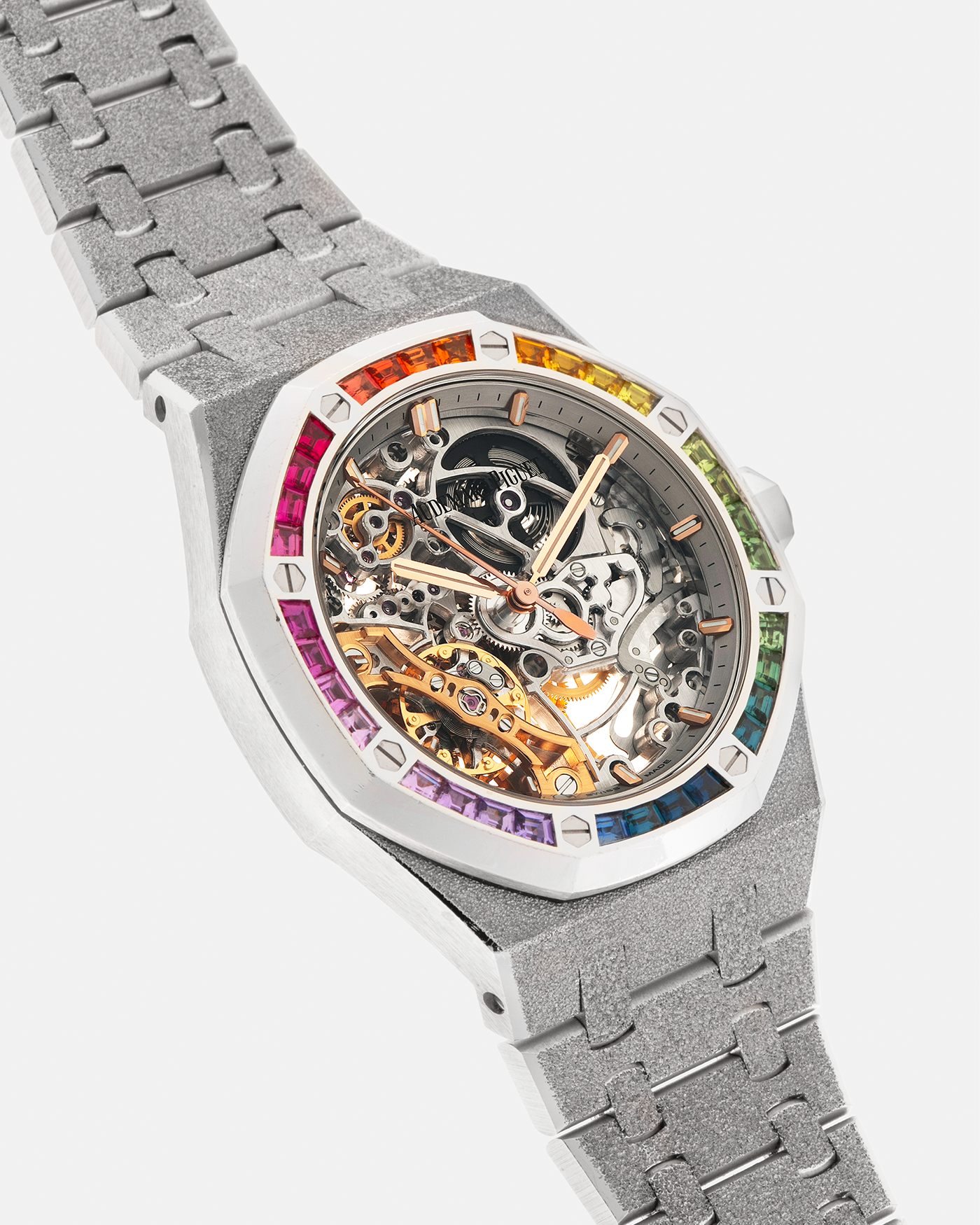 Brand: Audemars Piguet
Year: 2019
Model: Royal Oak
Reference Number: 15468BC
Material: 18-carat White Gold, Multi-Colored Baguette-Cut Sapphires
Movement: Audemars Piguet Cal. 3132, Self-Winding
Case Dimensions: 37mm x 10mm (46.2mm Lug-to-Lug)
Bracelet: Audemars Piguet Integrated 18-carat White Gold Bracelet with Frosted Finish and signed ‘AP’ Folding Clasp
