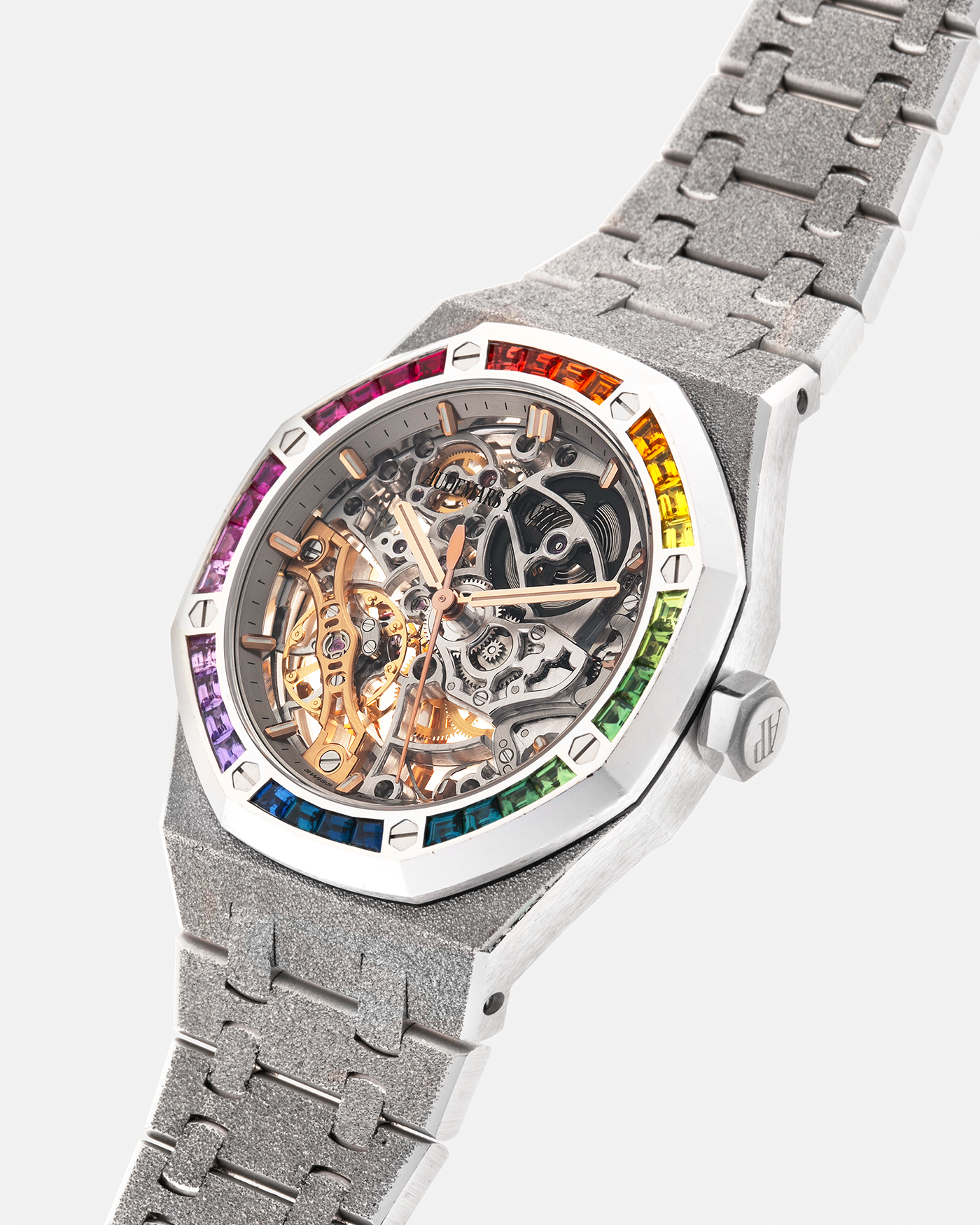 Brand: Audemars Piguet
Year: 2019
Model: Royal Oak
Reference Number: 15468BC
Material: 18-carat White Gold, Multi-Colored Baguette-Cut Sapphires
Movement: Audemars Piguet Cal. 3132, Self-Winding
Case Dimensions: 37mm x 10mm (46.2mm Lug-to-Lug)
Bracelet: Audemars Piguet Integrated 18-carat White Gold Bracelet with Frosted Finish and signed ‘AP’ Folding Clasp