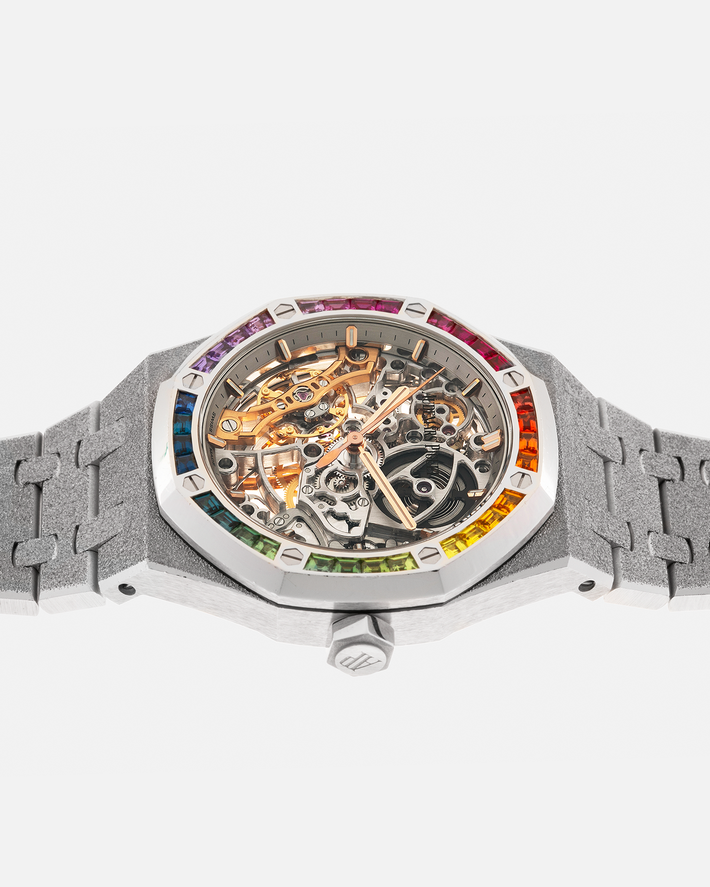 Brand: Audemars Piguet
Year: 2019
Model: Royal Oak
Reference Number: 15468BC
Material: 18-carat White Gold, Multi-Colored Baguette-Cut Sapphires
Movement: Audemars Piguet Cal. 3132, Self-Winding
Case Dimensions: 37mm x 10mm (46.2mm Lug-to-Lug)
Bracelet: Audemars Piguet Integrated 18-carat White Gold Bracelet with Frosted Finish and signed ‘AP’ Folding Clasp
