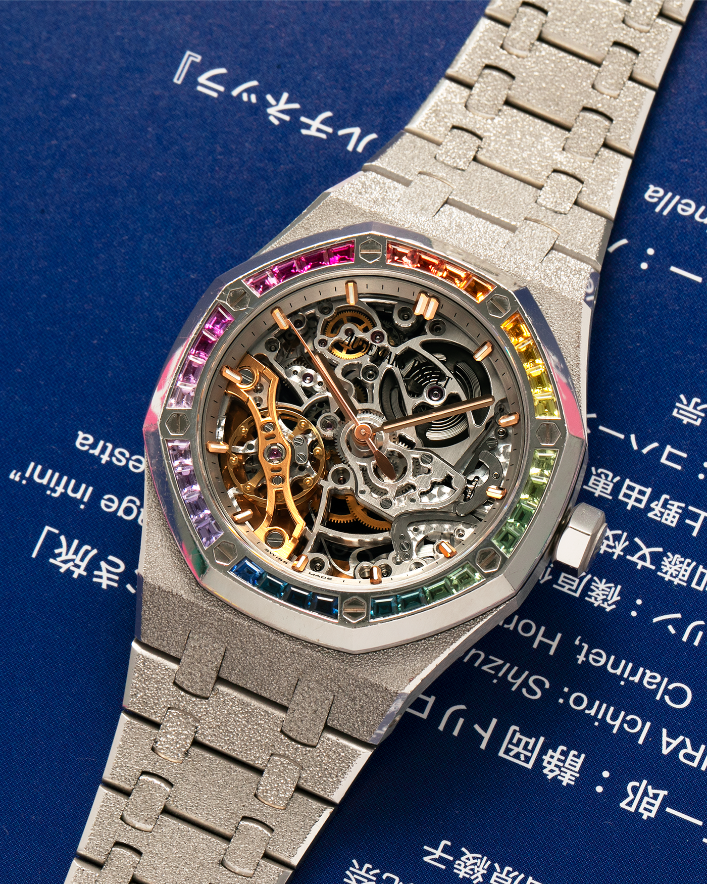 Brand: Audemars Piguet
Year: 2019
Model: Royal Oak
Reference Number: 15468BC
Material: 18-carat White Gold, Multi-Colored Baguette-Cut Sapphires
Movement: Audemars Piguet Cal. 3132, Self-Winding
Case Dimensions: 37mm x 10mm (46.2mm Lug-to-Lug)
Bracelet: Audemars Piguet Integrated 18-carat White Gold Bracelet with Frosted Finish and signed ‘AP’ Folding Clasp
