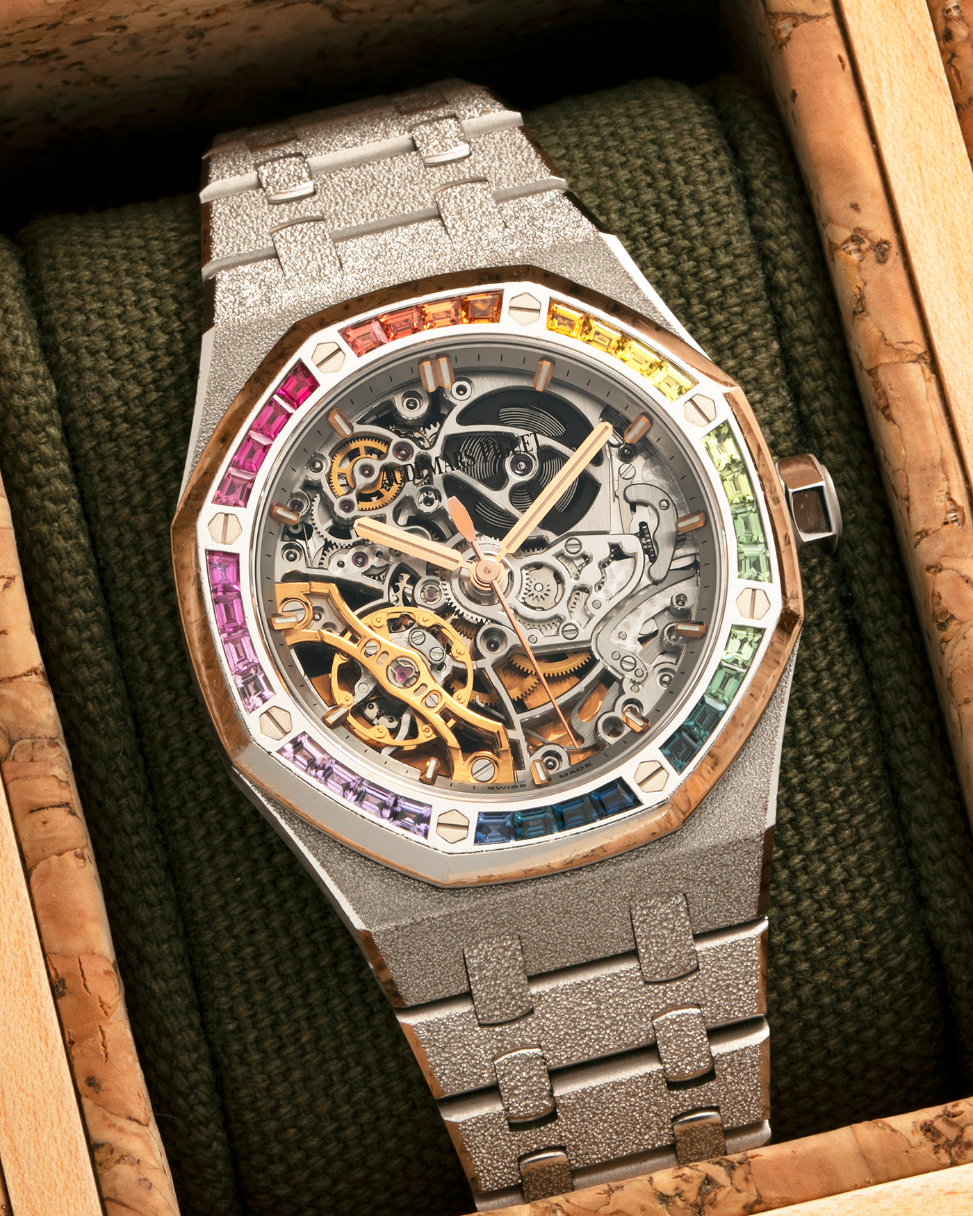 Brand: Audemars Piguet
Year: 2019
Model: Royal Oak
Reference Number: 15468BC
Material: 18-carat White Gold, Multi-Colored Baguette-Cut Sapphires
Movement: Audemars Piguet Cal. 3132, Self-Winding
Case Dimensions: 37mm x 10mm (46.2mm Lug-to-Lug)
Bracelet: Audemars Piguet Integrated 18-carat White Gold Bracelet with Frosted Finish and signed ‘AP’ Folding Clasp