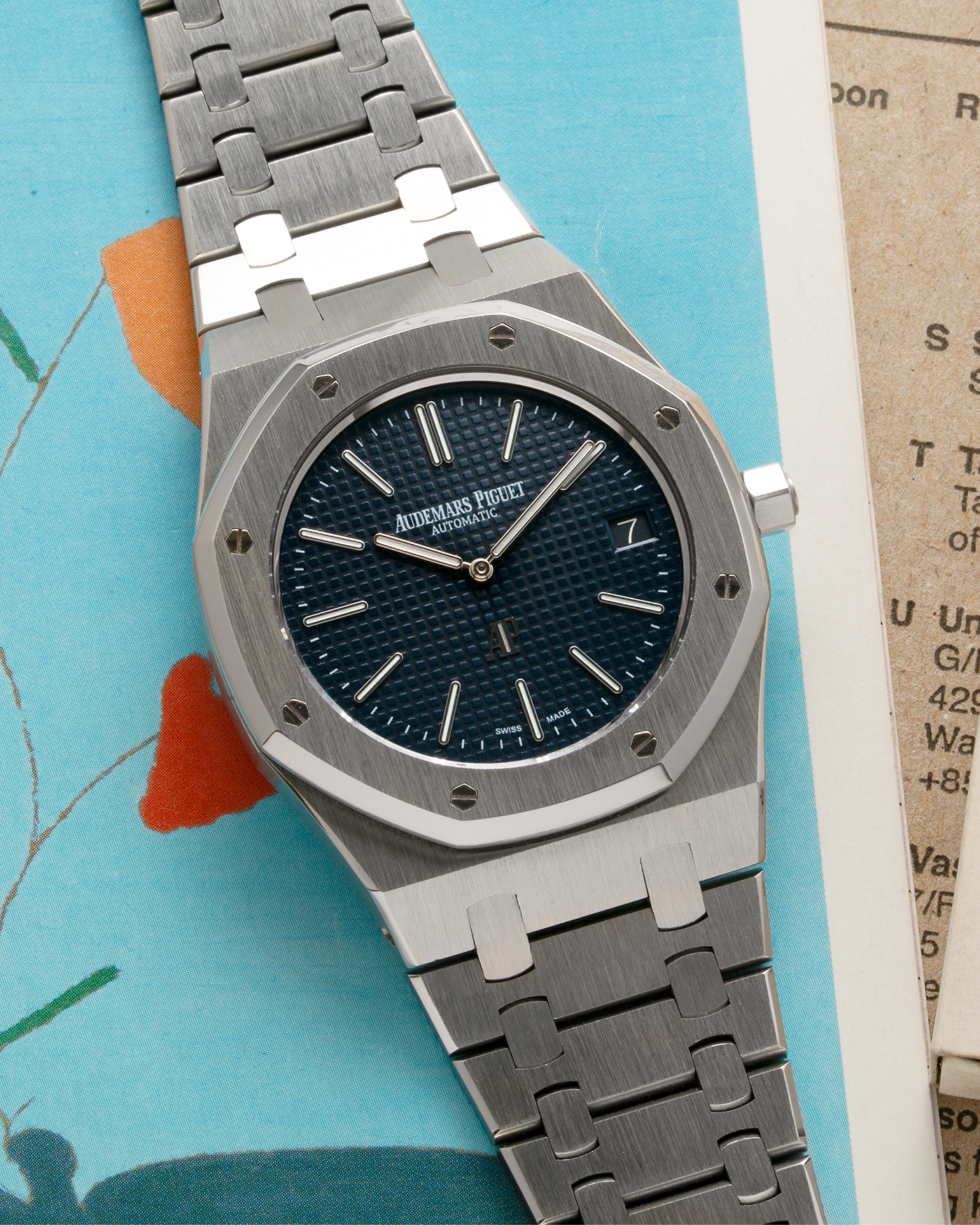 Brand: Audemars Piguet Year: 2014 Model: Royal Oak Reference Number: 15202ST.OO.1240ST.01 Material: Stainless Steel Movement: Audemars Piguet Cal. 2121 (Derived from JLC Cal. 920), Self-Winding Case Dimensions: 39mm x 8.1mm Bracelet: Audemars Piguet Stainless Steel Integrated Bracelet