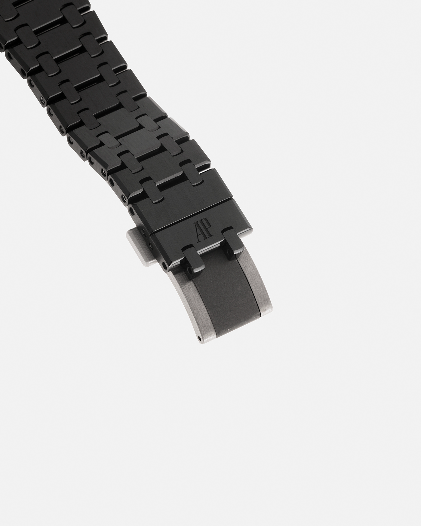 Brand: Audemars Piguet Year: 2021 Model: Royal Oak Perpetual Calendar Openworked, Boutique-only Edition Reference Number: 26585CE Material: Ceramic Movement: Audemars Piguet Cal. 5135, Self-Winding Case Dimensions: 41mm x 9.9mm Bracelet: Audemars Piguet Integrated Black Ceramic Bracelet with Signed Titanium Clasp