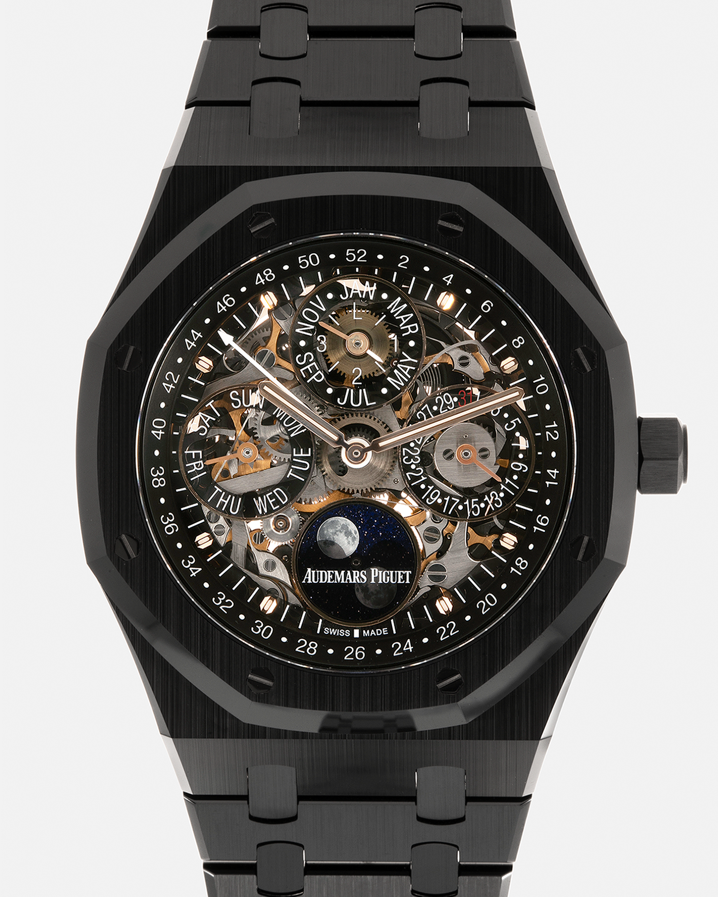 Brand: Audemars Piguet Year: 2021 Model: Royal Oak Perpetual Calendar Openworked, Boutique-only Edition Reference Number: 26585CE Material: Ceramic Movement: Audemars Piguet Cal. 5135, Self-Winding Case Dimensions: 41mm x 9.9mm Bracelet: Audemars Piguet Integrated Black Ceramic Bracelet with Signed Titanium Clasp